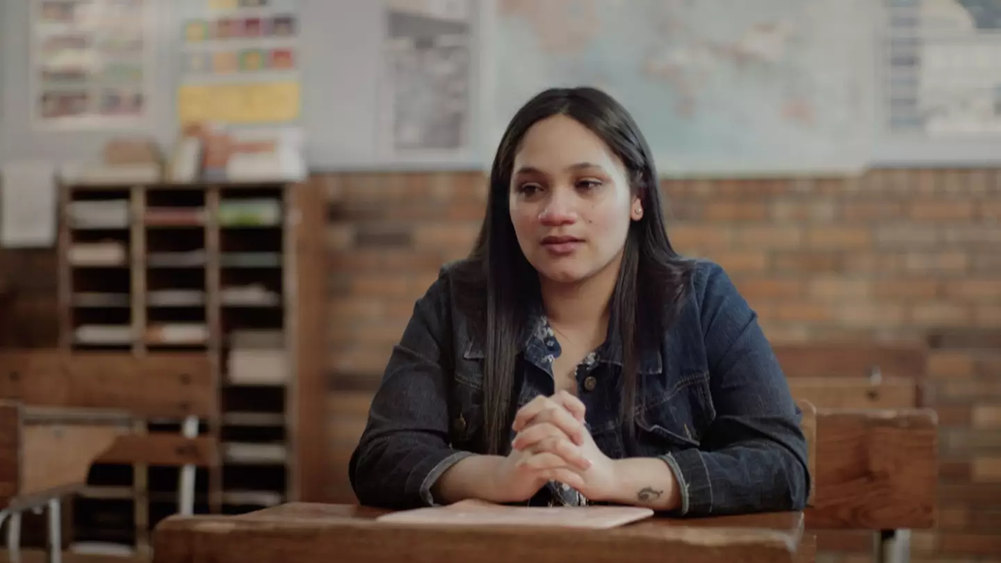 Cassidy is interviewed in her old classroom.