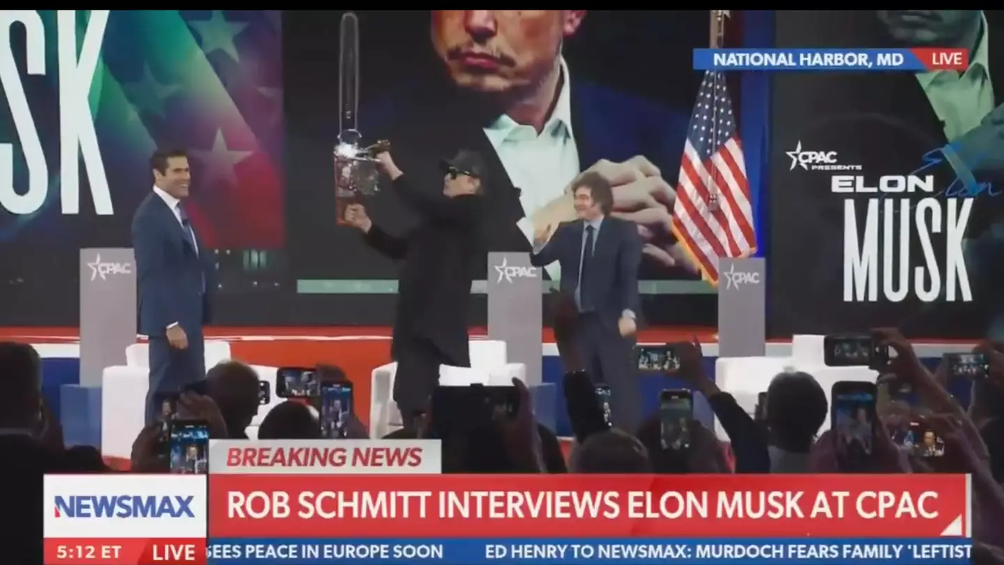 Elon Musk slammed after wielding chainsaw on stage for bizarre reason