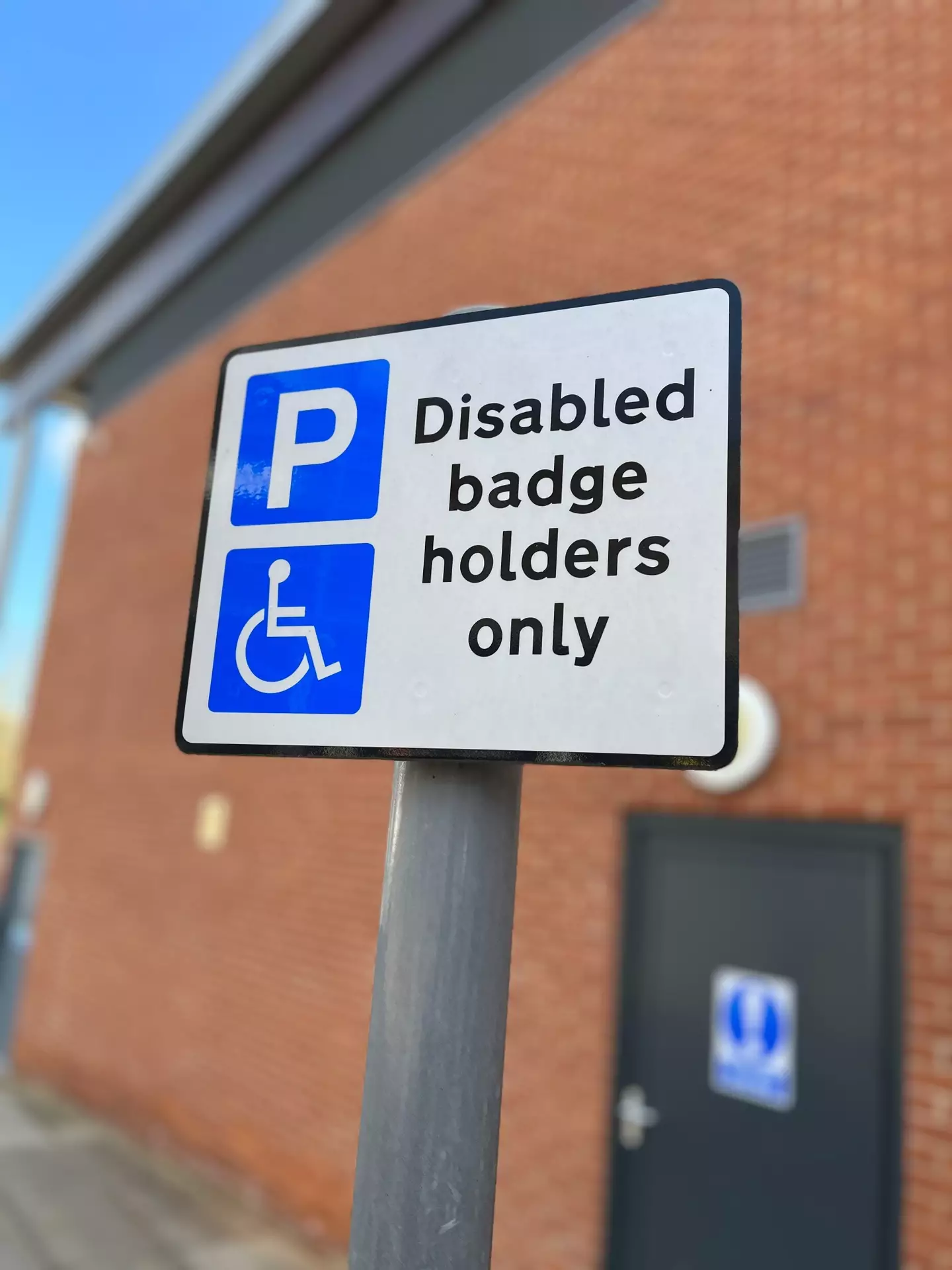 The pregnant woman was fined for parking in a disabled spot.