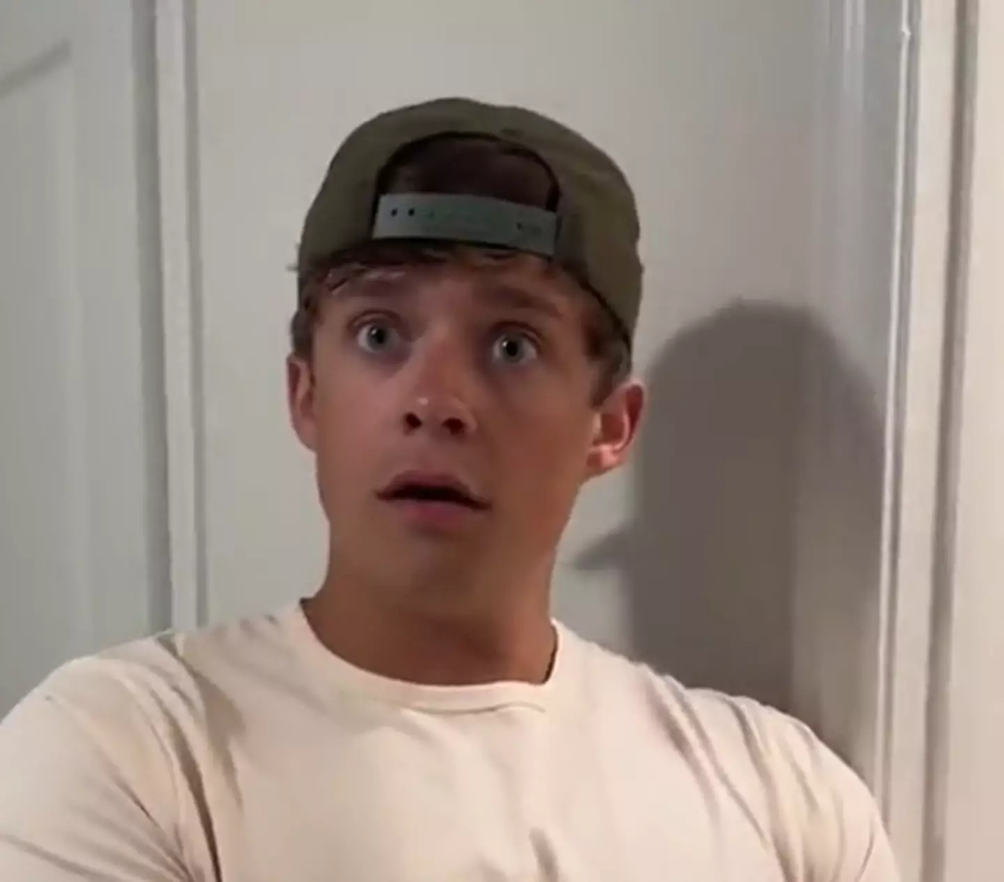 The face of a man who has just been told his wife has bought about 200 outfits for their baby.