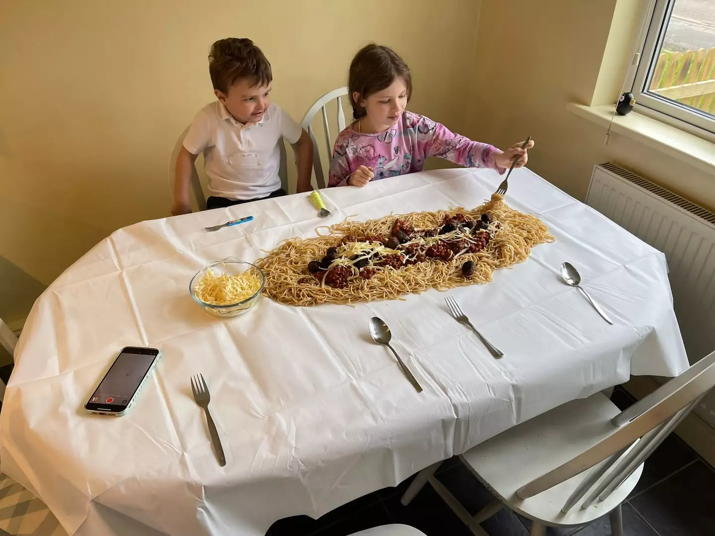 The bizarre dinner arrangement proved to be the ultimate 'no washing up' hack.
