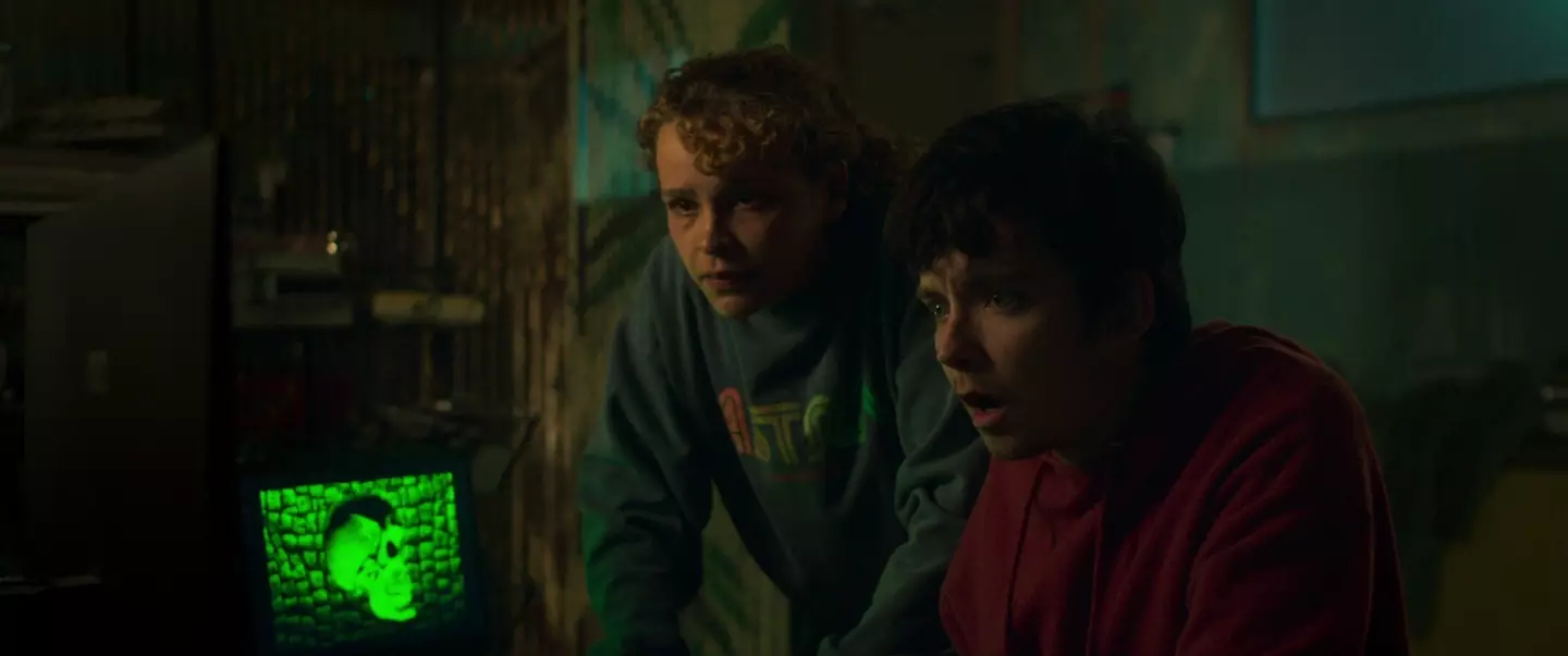 Iola Evans and Asa Butterfield in Choose or Die.