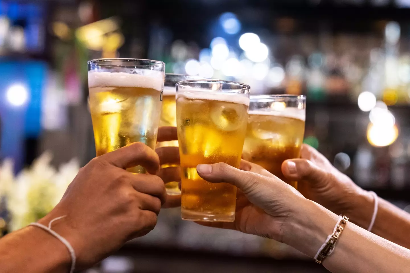 Having a drink or two with friends as we head into the New Year is normal, but experts warn of a sign (Getty Stock Images)
