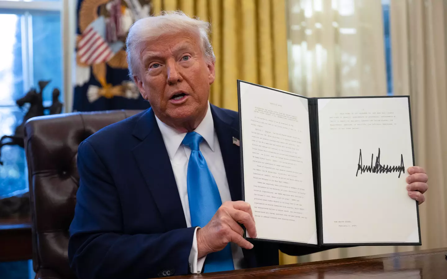 Trump signed several orders (ANDREW CABALLERO-REYNOLDS/AFP via Getty Images)