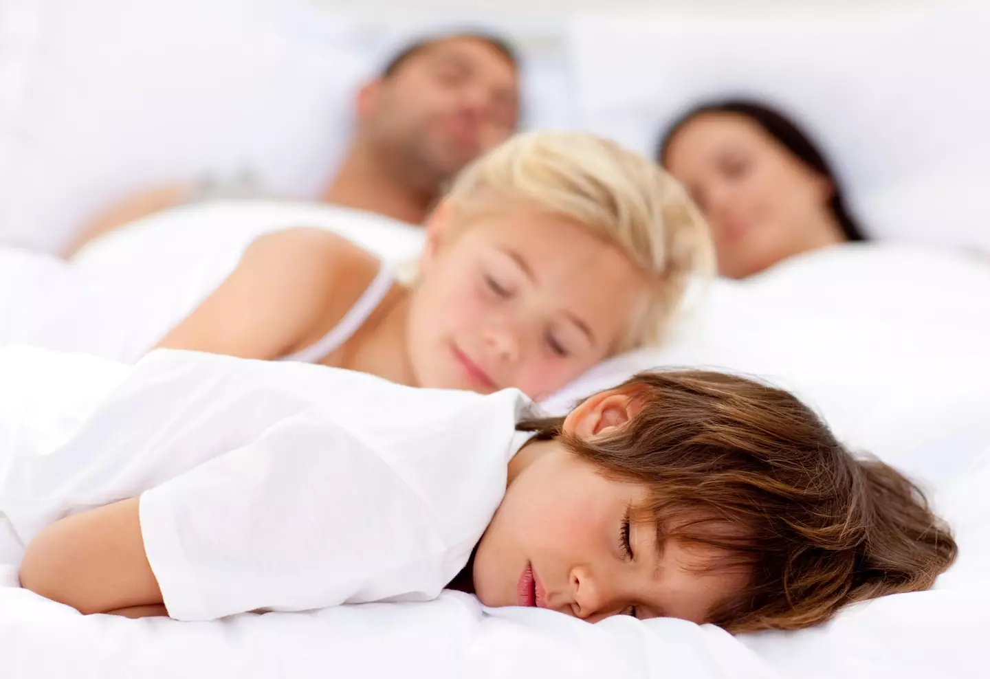 Parents are sharing why they let their children sleep in their bed.