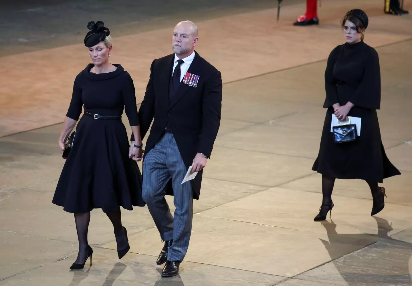 Zara and Mike Tindall also held hands.