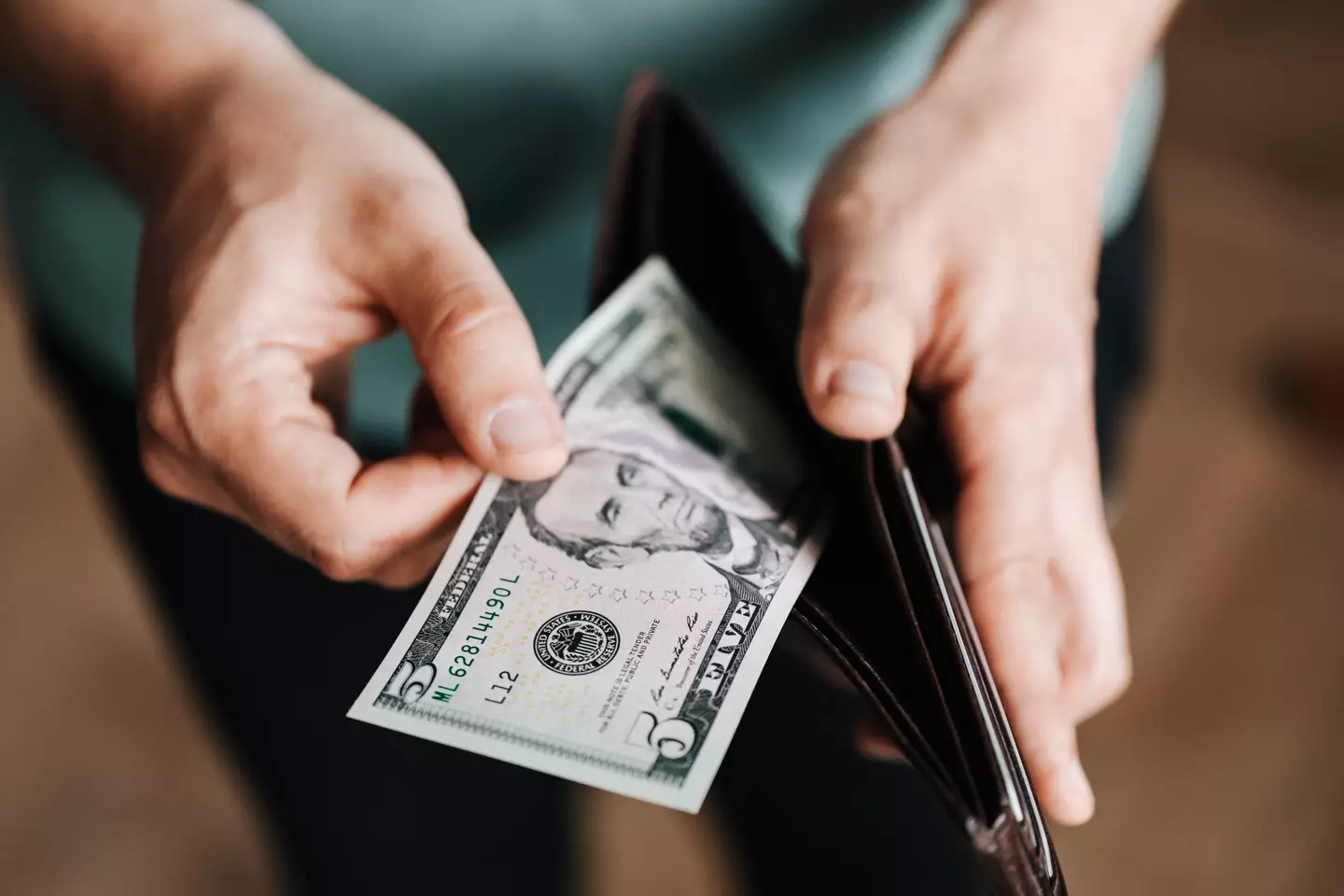 The man earns ten times less than the woman.