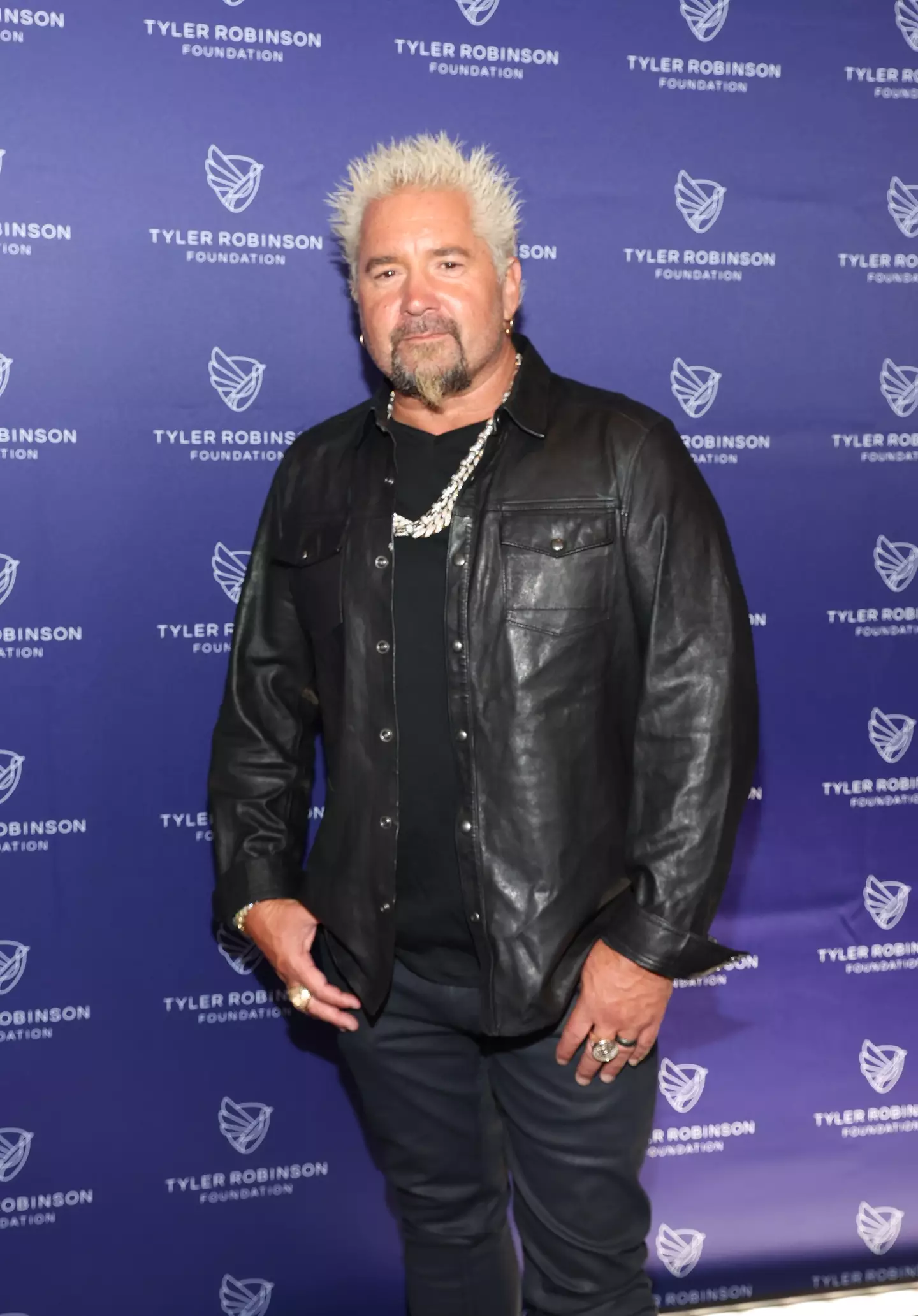 Guy Fieri, who celebrated his 58th birthday yesterday, looks worlds away from his normal self in the video (Jesse Grant/Getty Images for Tyler Robinson Foundation)