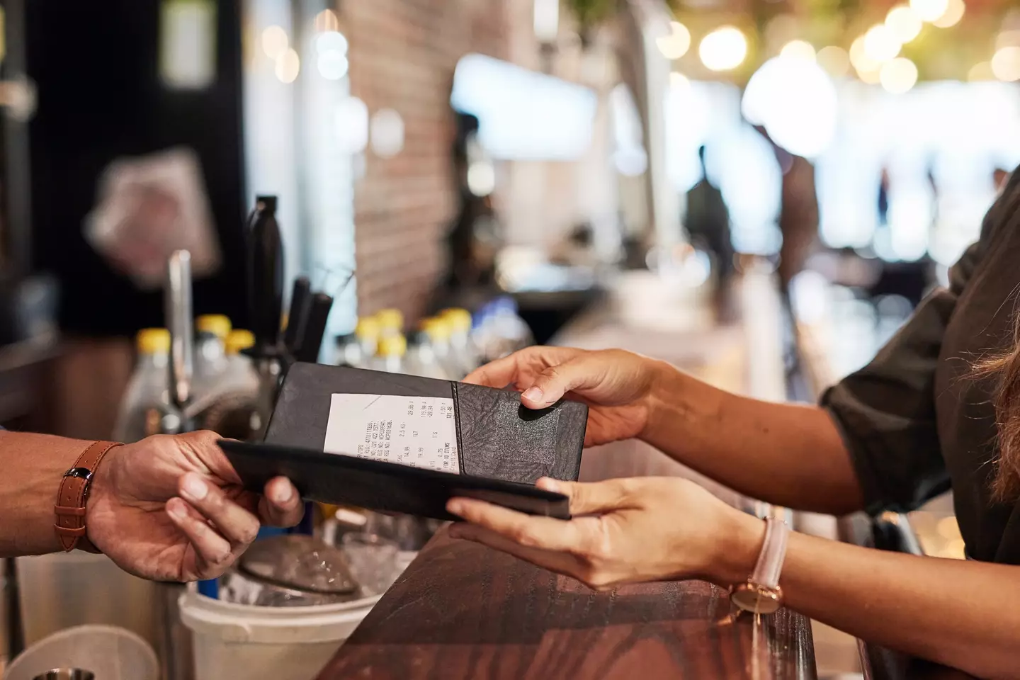 The diner was really confused by the extra charge (LumiNola/Getty Images)