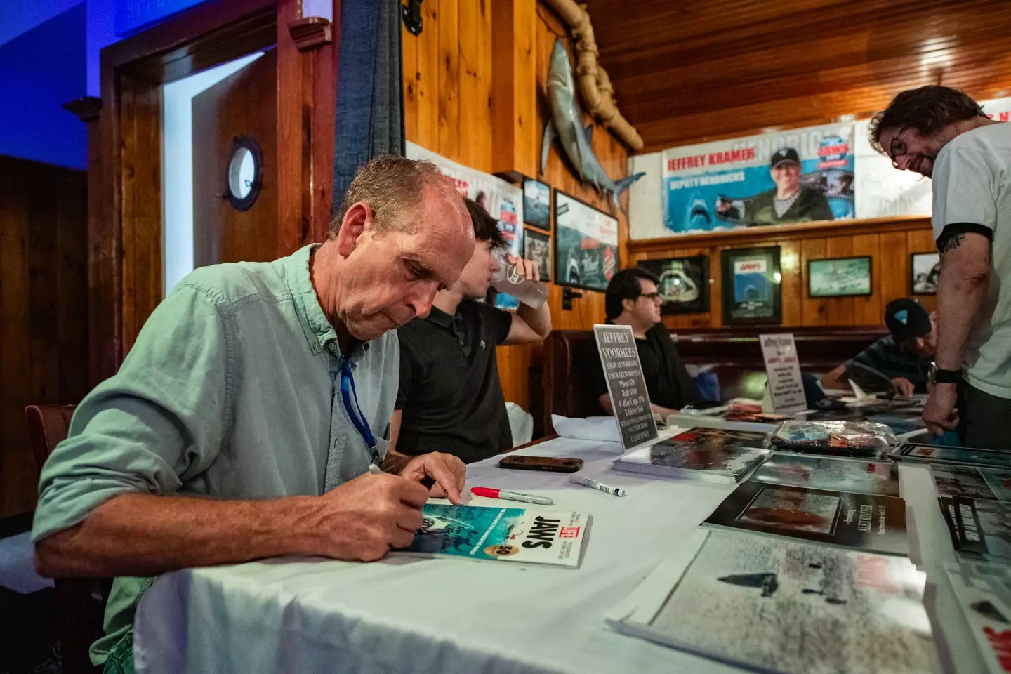 Voorhees pictured signing autographs for the Jaws 50th Anniversary earlier this year (JOSEPH PREZIOSO/AFP via Getty Images)