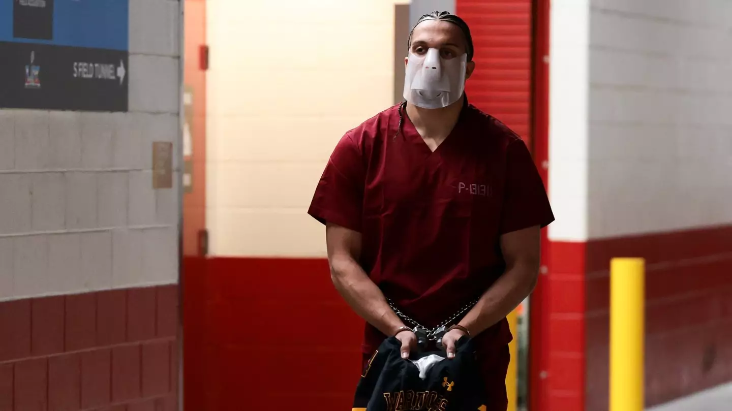 Why Super Bowl player turned up barefoot and in handcuffs before game