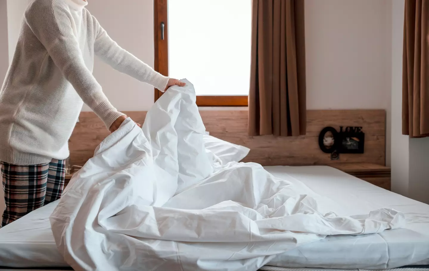 A doctor has warned people NOT to make their beds straight away (Biserka Stojanovic/Getty)