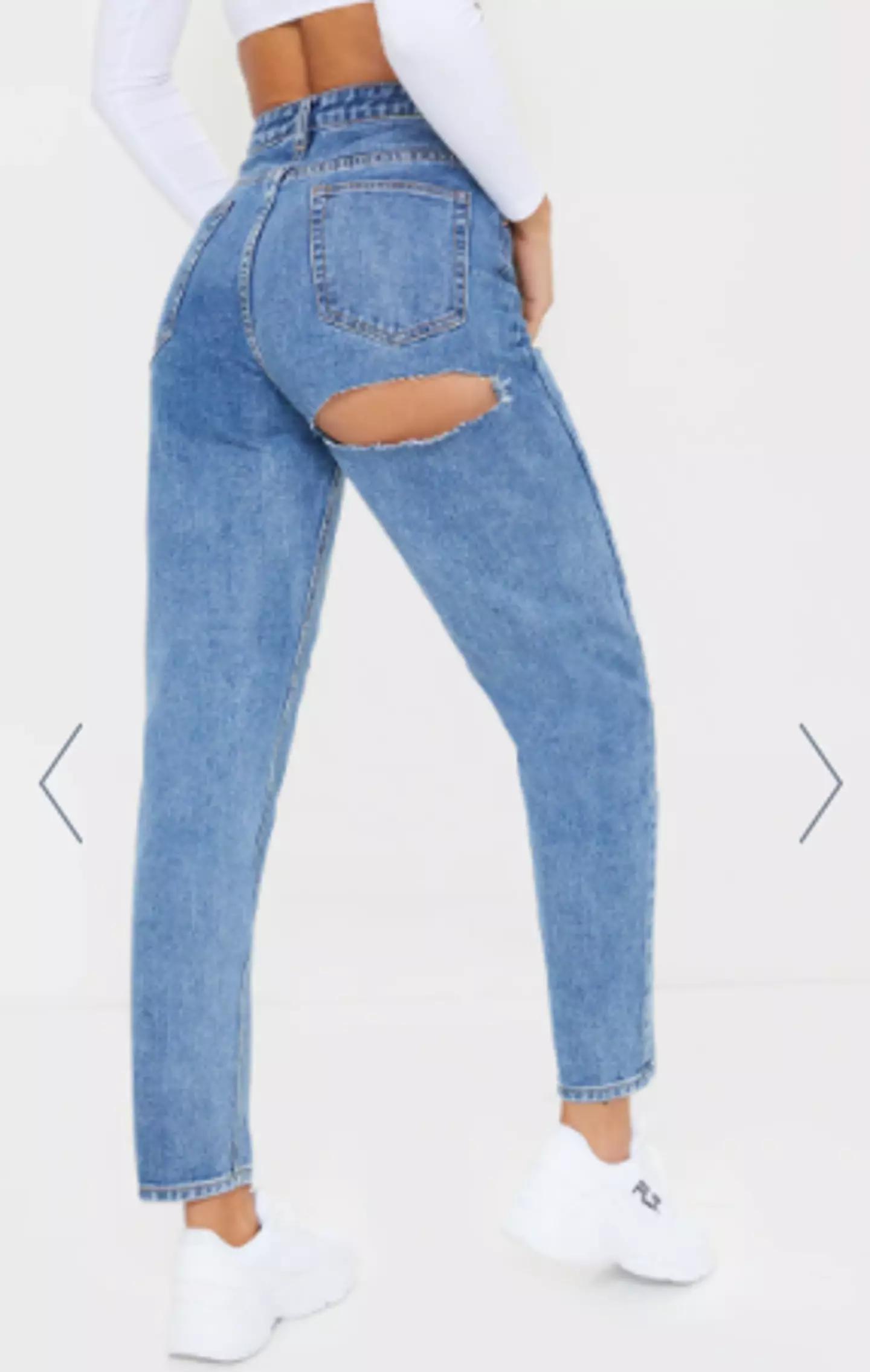 ASOS and Topshop are not the only retailer to put out bum rip jeans. (