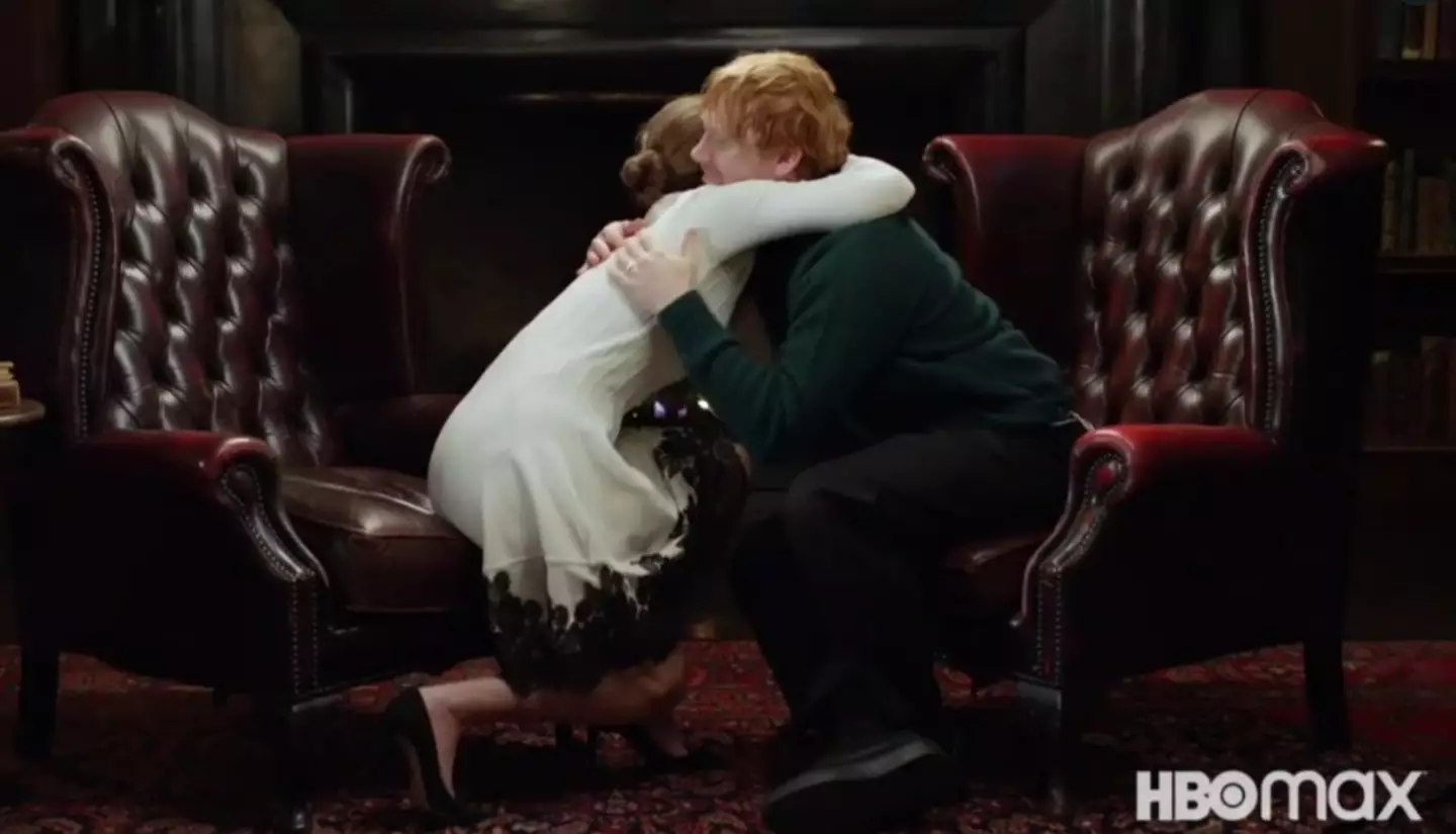Emma and Rupert share a hug (