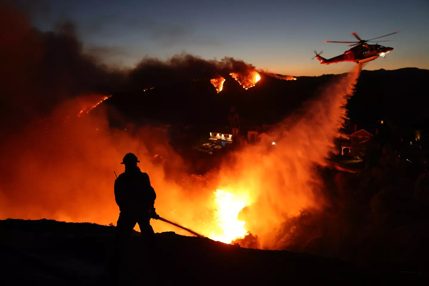 The Los Angeles wildfires have now tragically claimed the lives of five people (DAVID SWANSON/AFP via Getty Images)