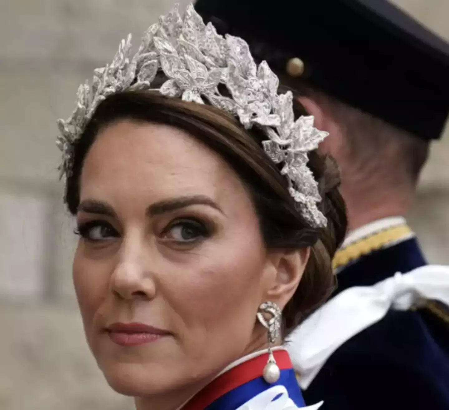 Princess Charlotte wore a matching headpiece with her mum Princess Kate.