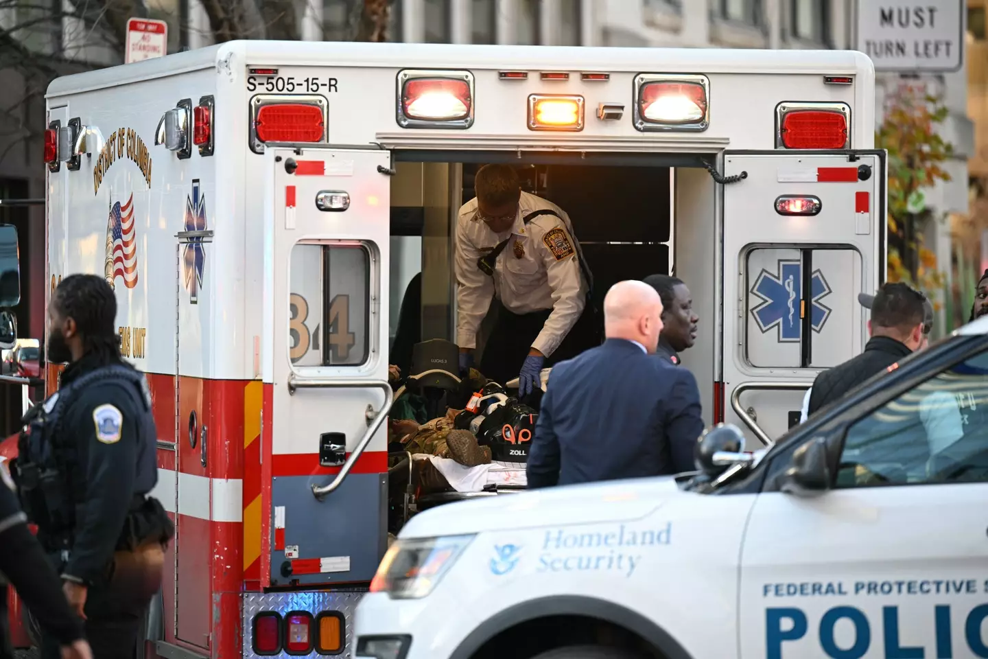 Another guard, Sgt. Andrew Wolfe, is said to be 'fighting for his life' (Drew ANGERER / AFP via Getty Images)