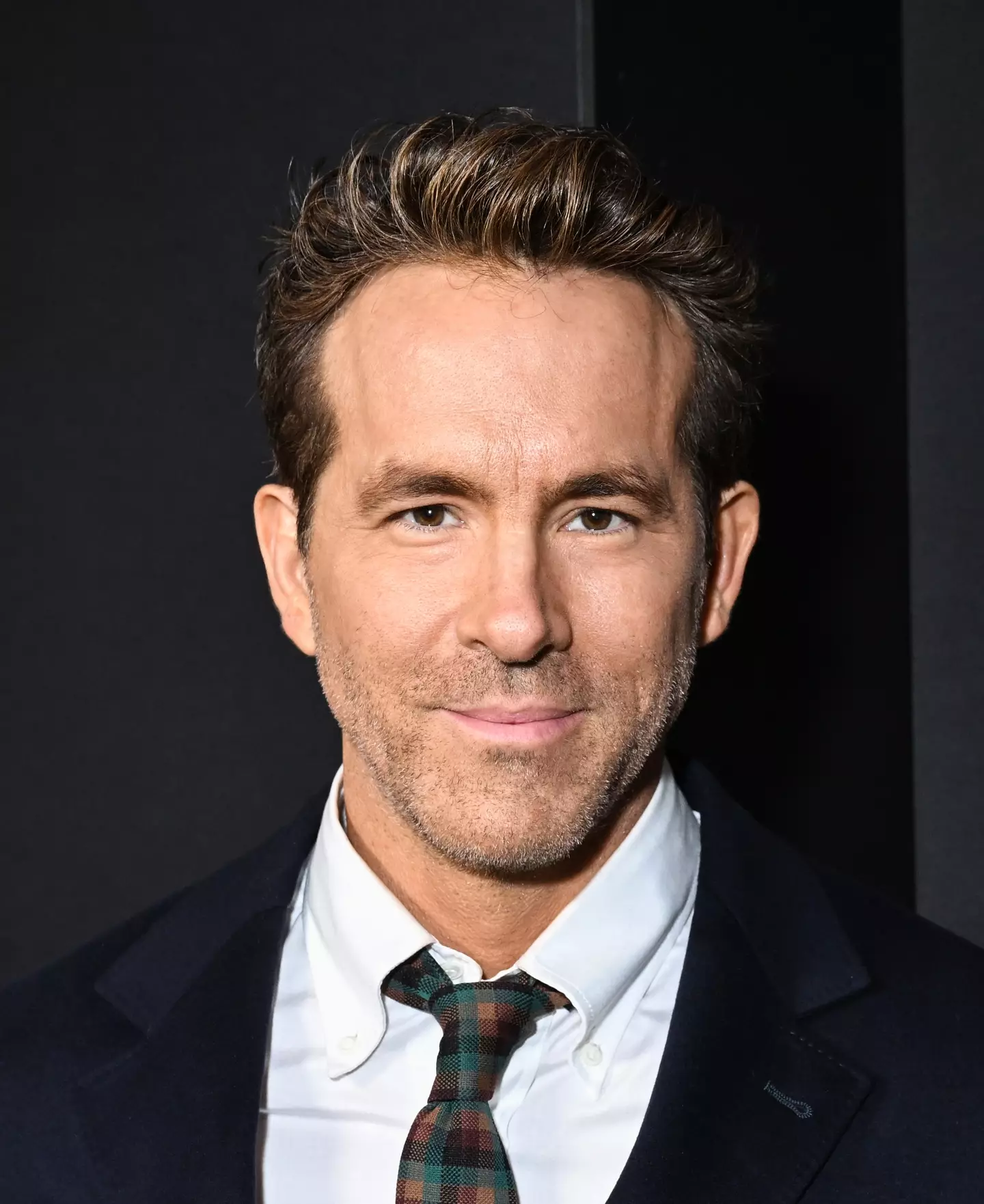 Ryan Reynolds is trying to raise his kids as 'normal' as possible. (Gilbert Flores/Variety via Getty Images)