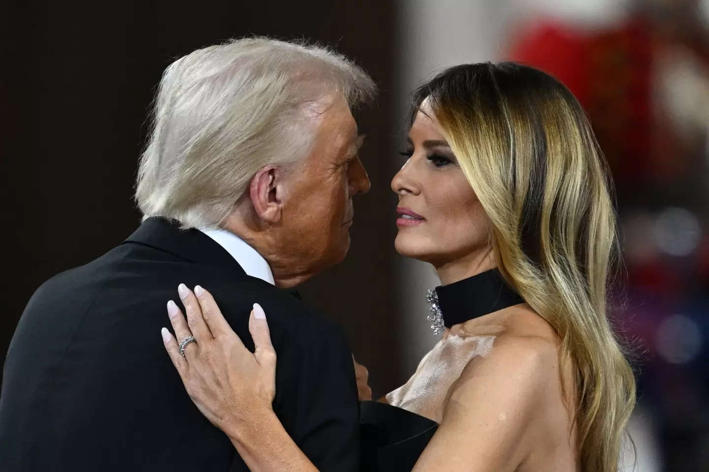 An expert claimed there is a different to Melania's expression when she dances with her husband (PATRICK T. FALLON/AFP via Getty Images)