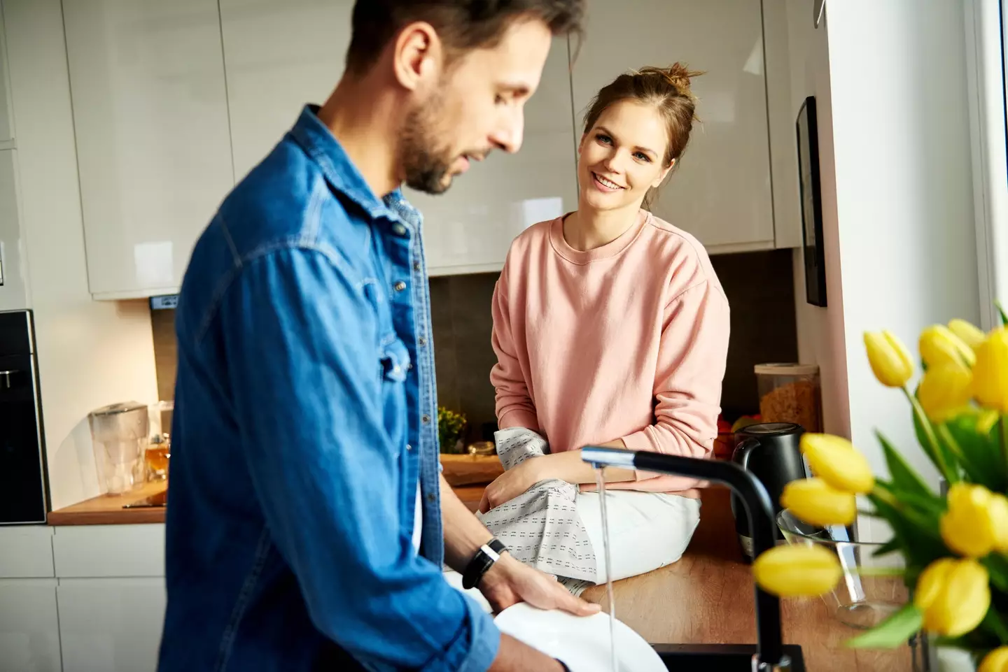 Women are talking about the chores they have to ask their husbands to do. (