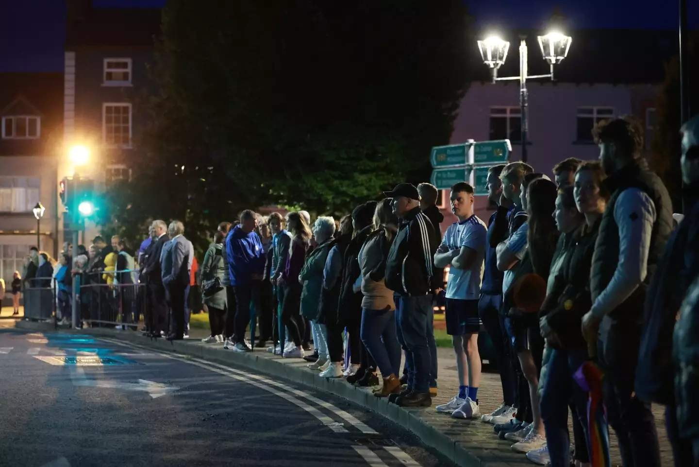 Hundreds of people from the local community stood on Monaghan Street in a show of support following the fatal car crash.