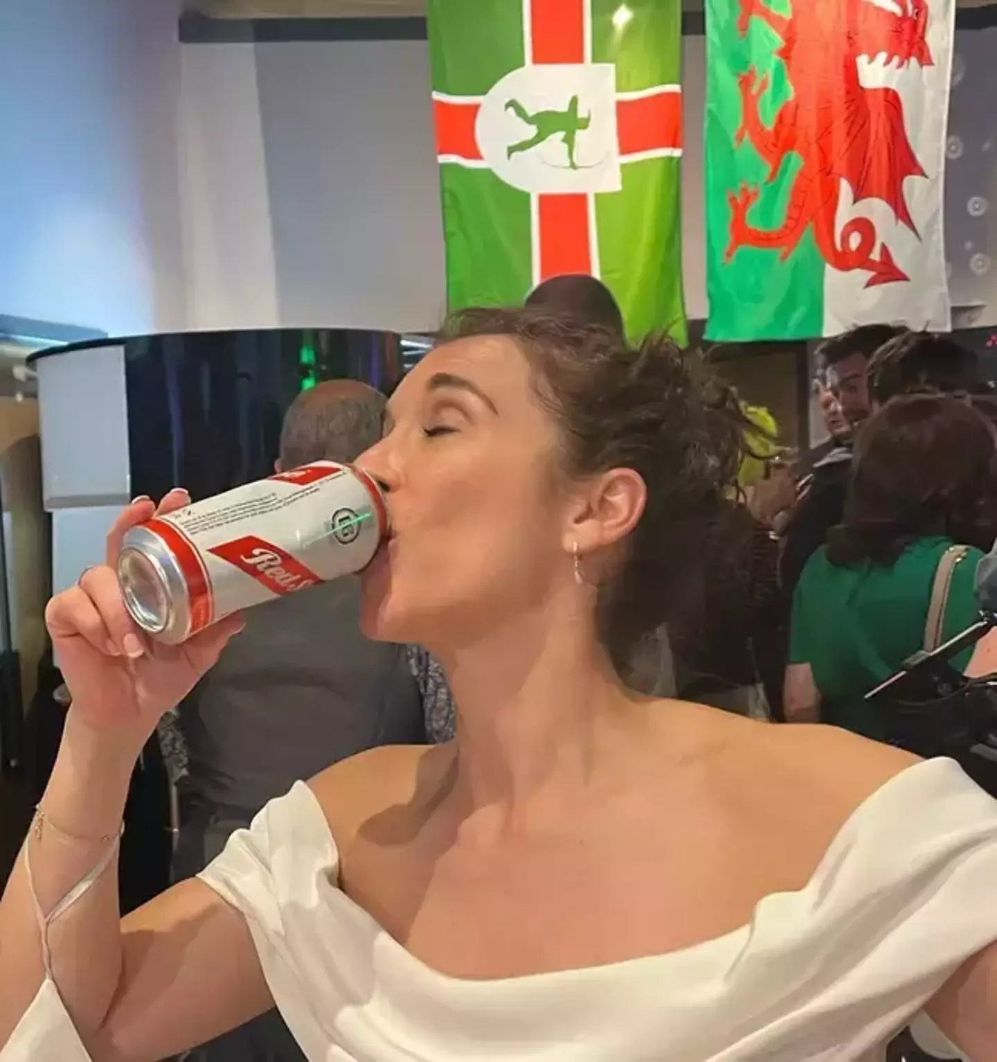 Vicky necked a Red Stripe during her celebrations.