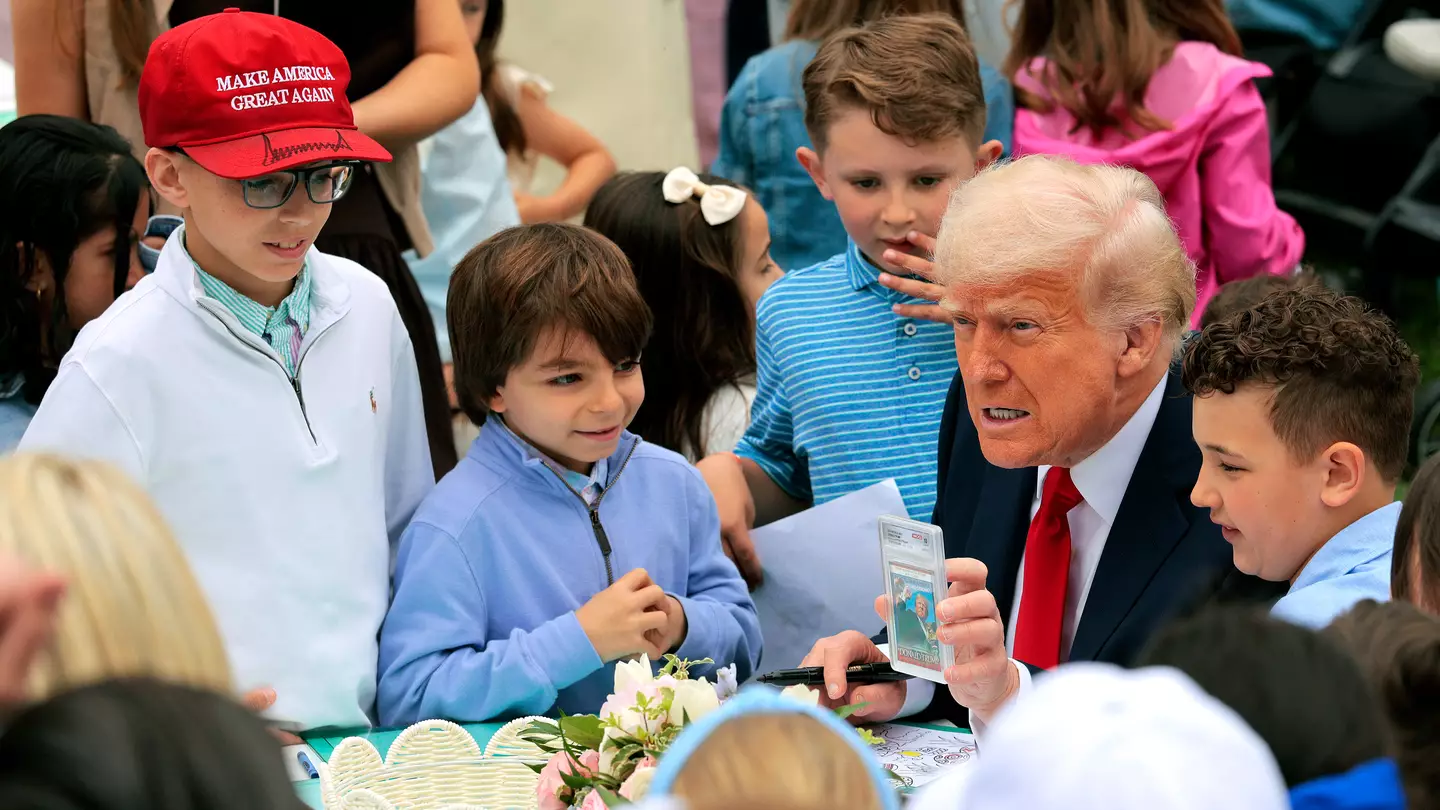 Donald Trump slammed after being spotted showing controversial photo to kids
