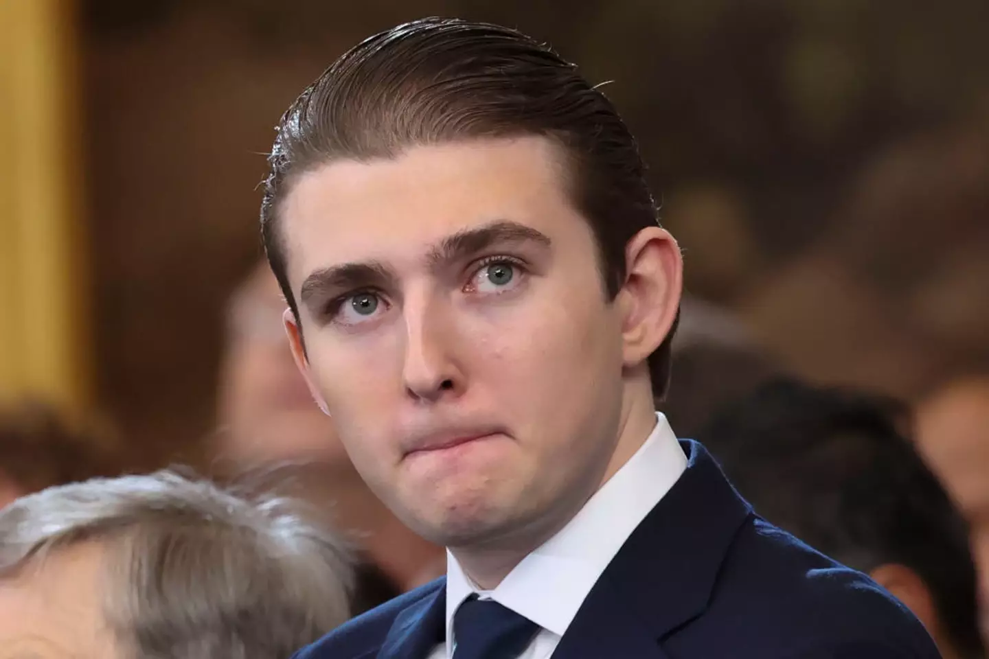 Barron Trump left people online very confused following his exchange with former president, Joe Biden (Pool / Getty Images)