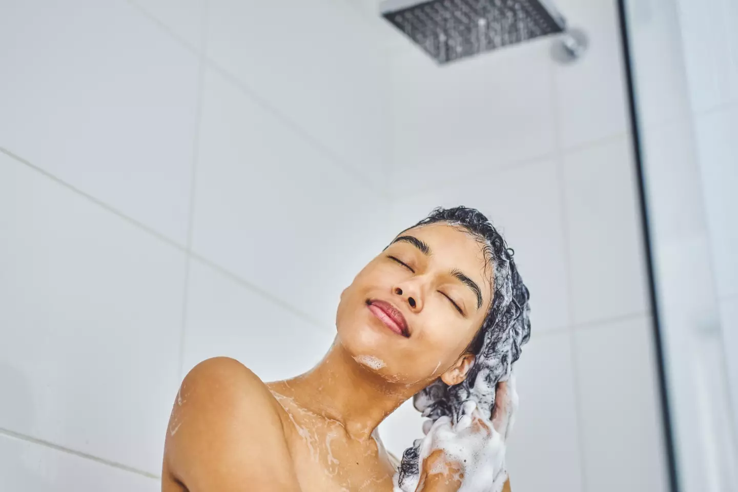 Lukewarm showers will lock in moisture whilst keeping your hair shiny.