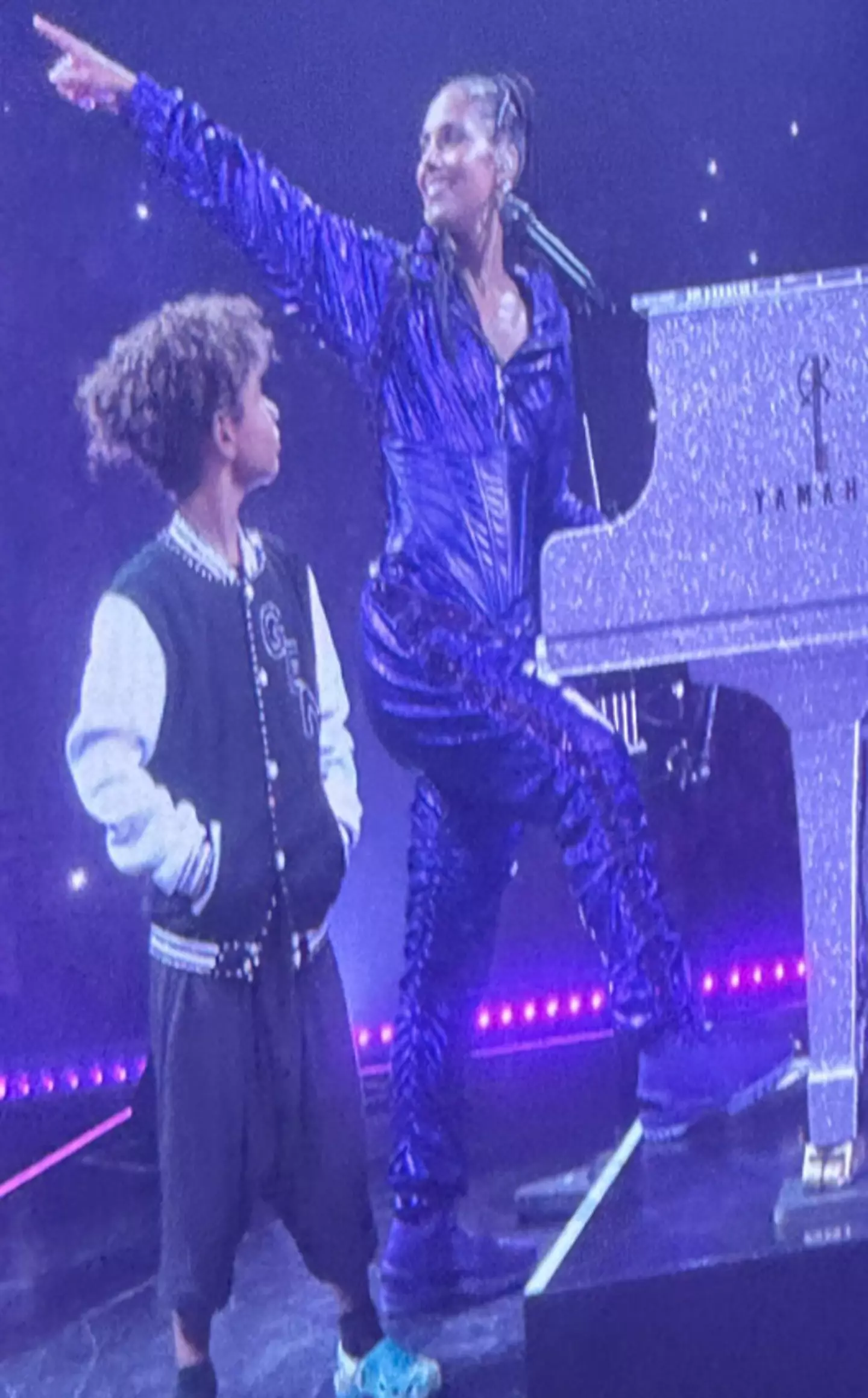 The eight-year-old appears to be taking his job very seriously.