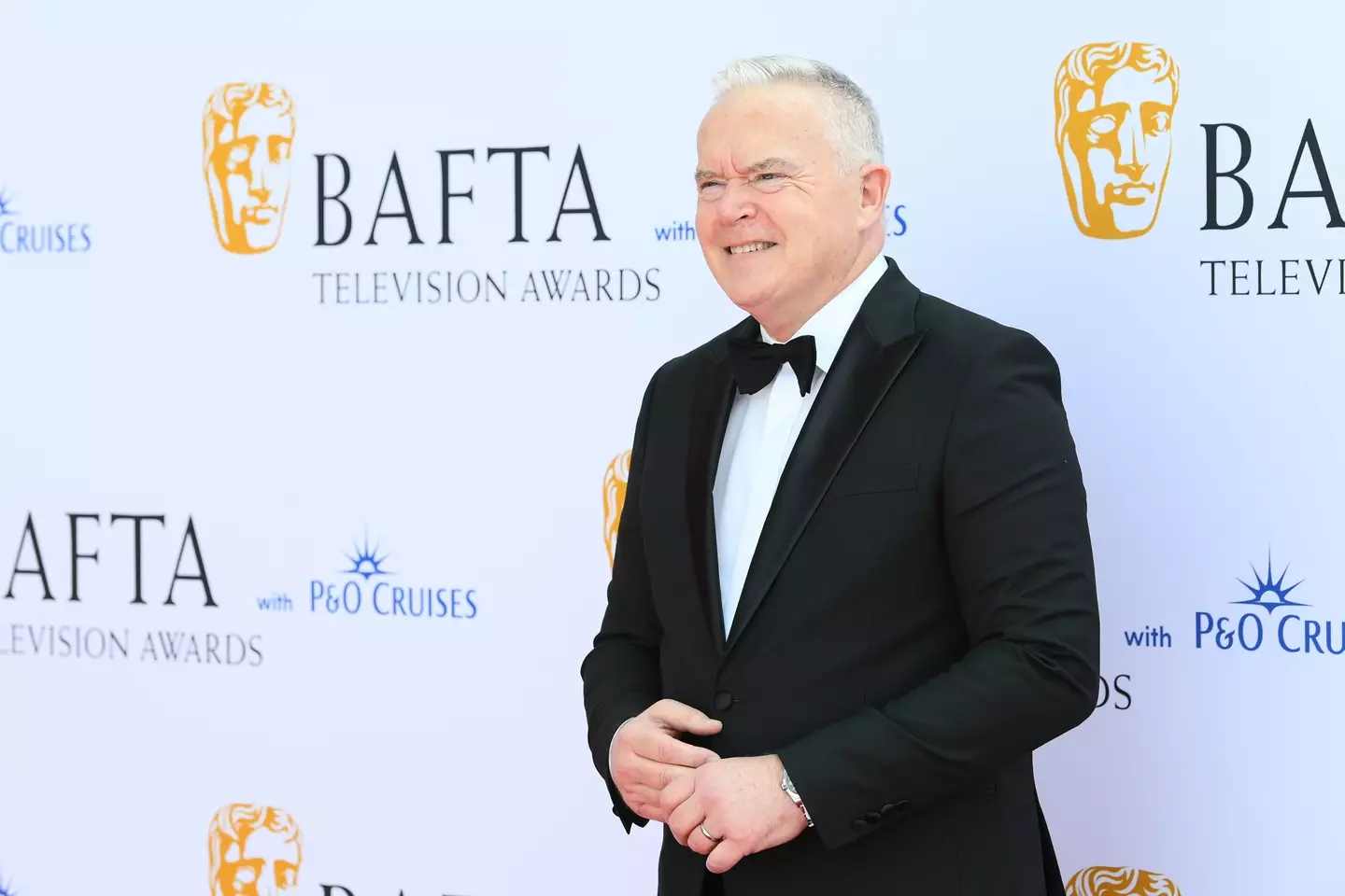 Huw Edwards will remain in hospital for the 'foreseeable future'.