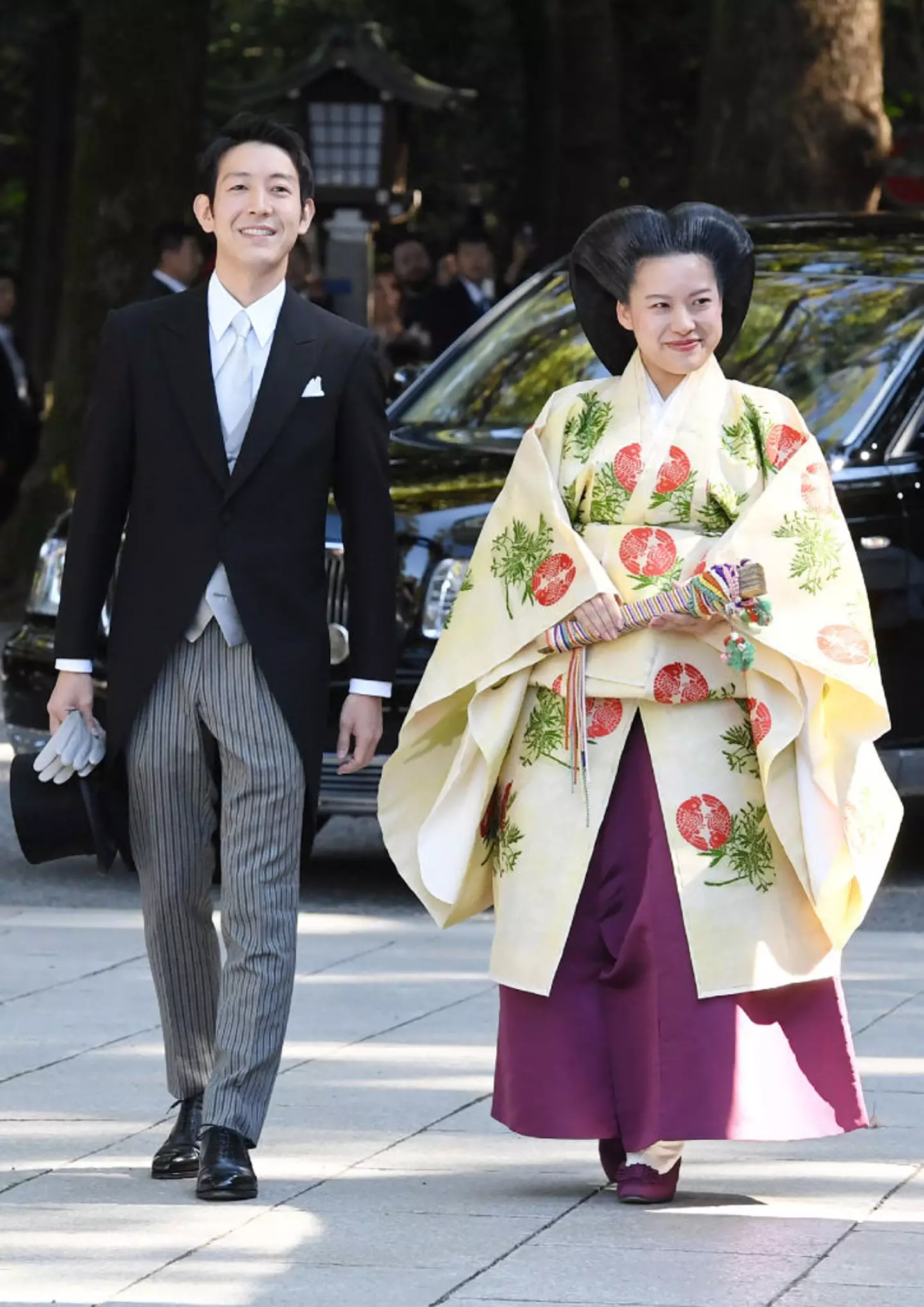 Princess Ayako and her husband Kei Moriya at their wedding (JIJI PRESS/AFP via Getty Images))