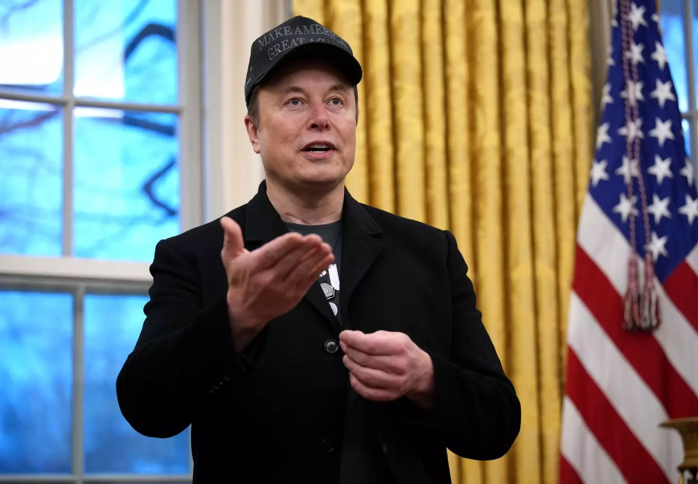 Musk also has been spotted suit-less (Andrew Harnik/Getty Images)