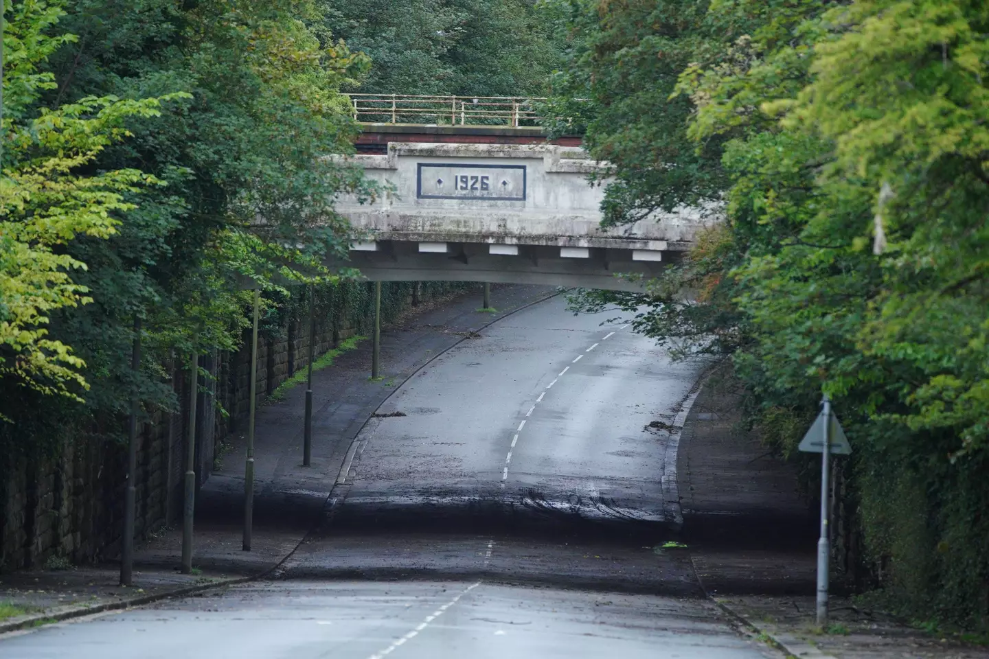 The car became trapped when the road flooded.