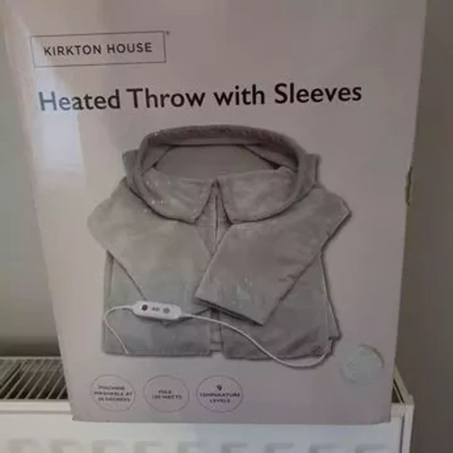 Heated throws aren't expensive to run, including this wearable one from Aldi.