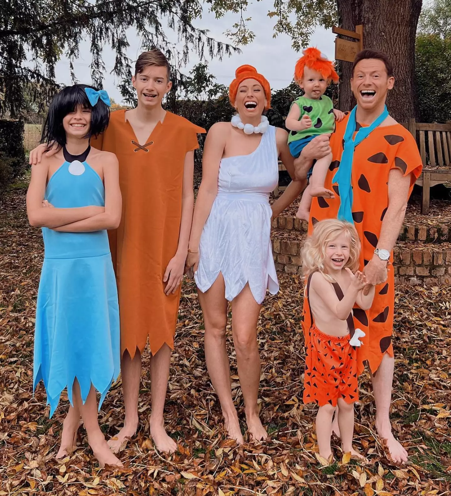 The family dressed as the Flintstones for Halloween.