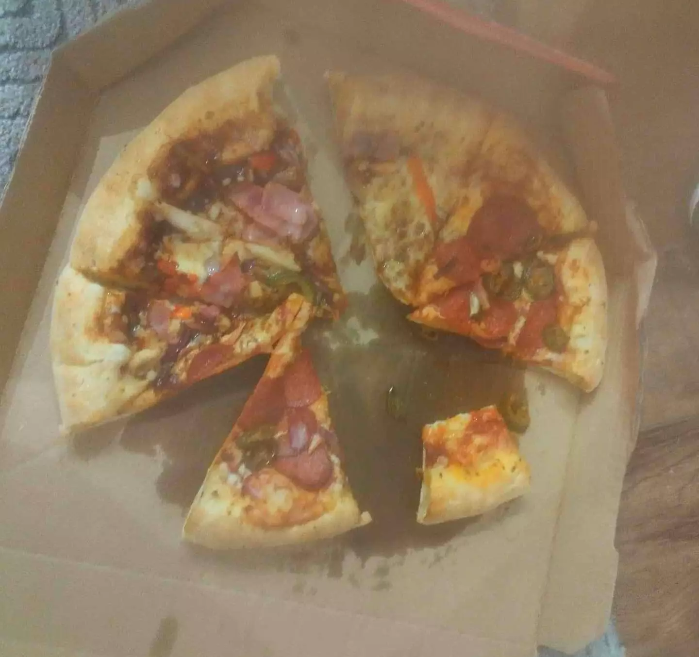 The pizza was missing a few slices.