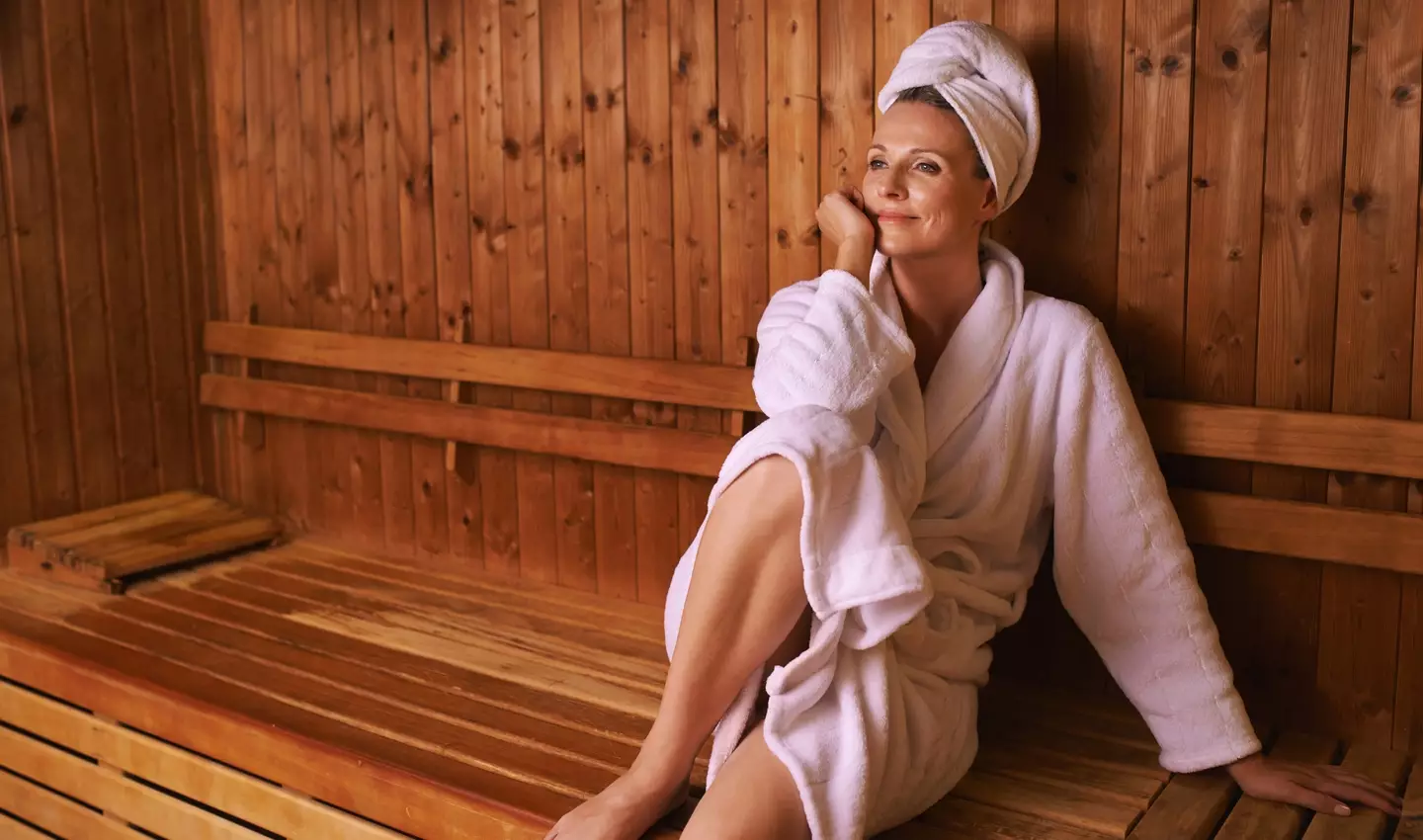 Saunas are often sold as the ultimate self-care health ritual (PeopleImages / Getty Images)