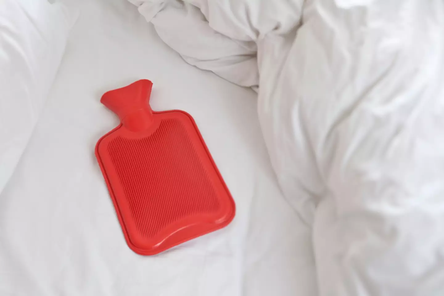 A hot water bottle will help turn your bed into a cocoon of cosiness.