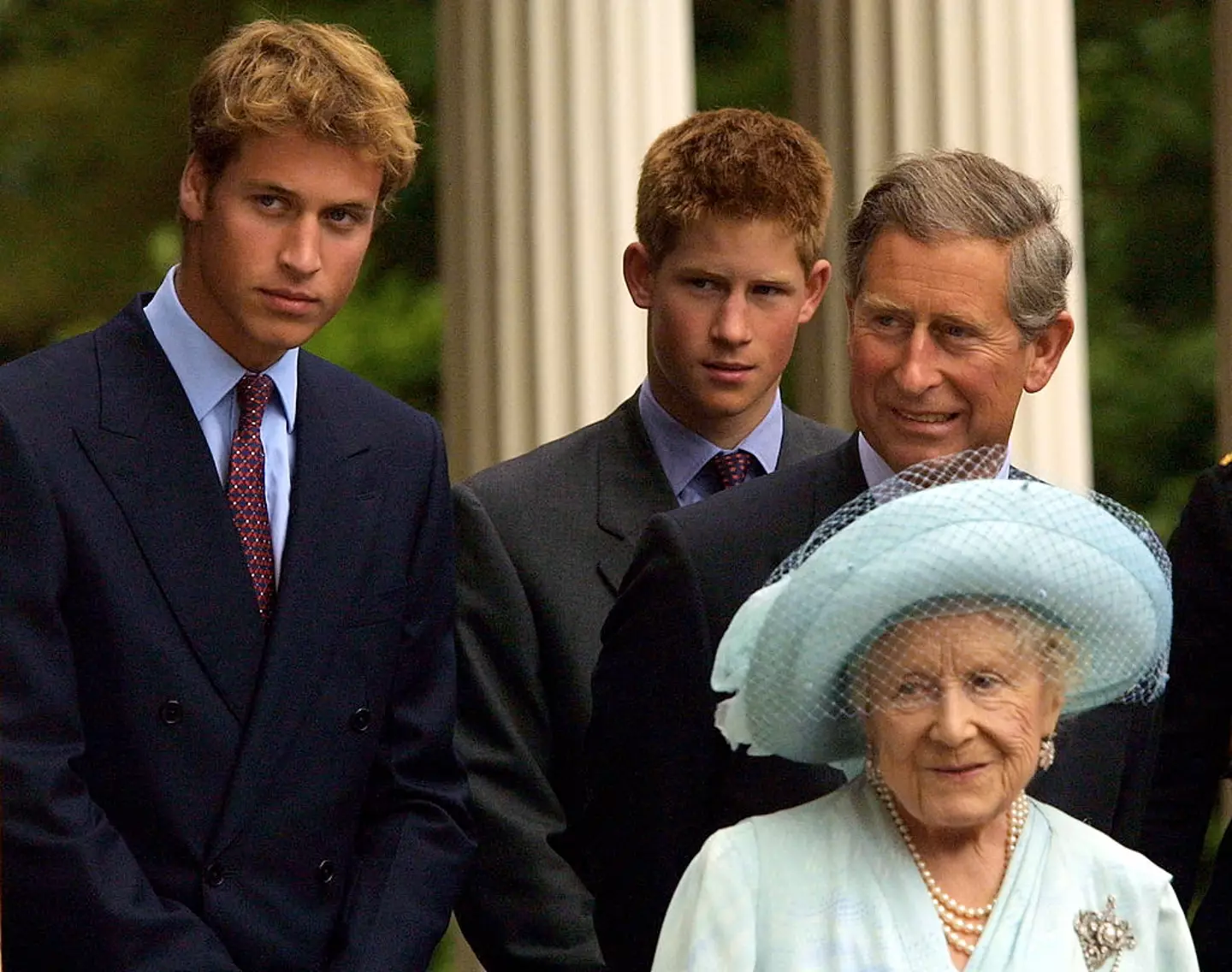 Prince William, Prince Harry, and King Charles III pictured with the Queen Mother in 2002. (Sion Touhig/Getty Images)