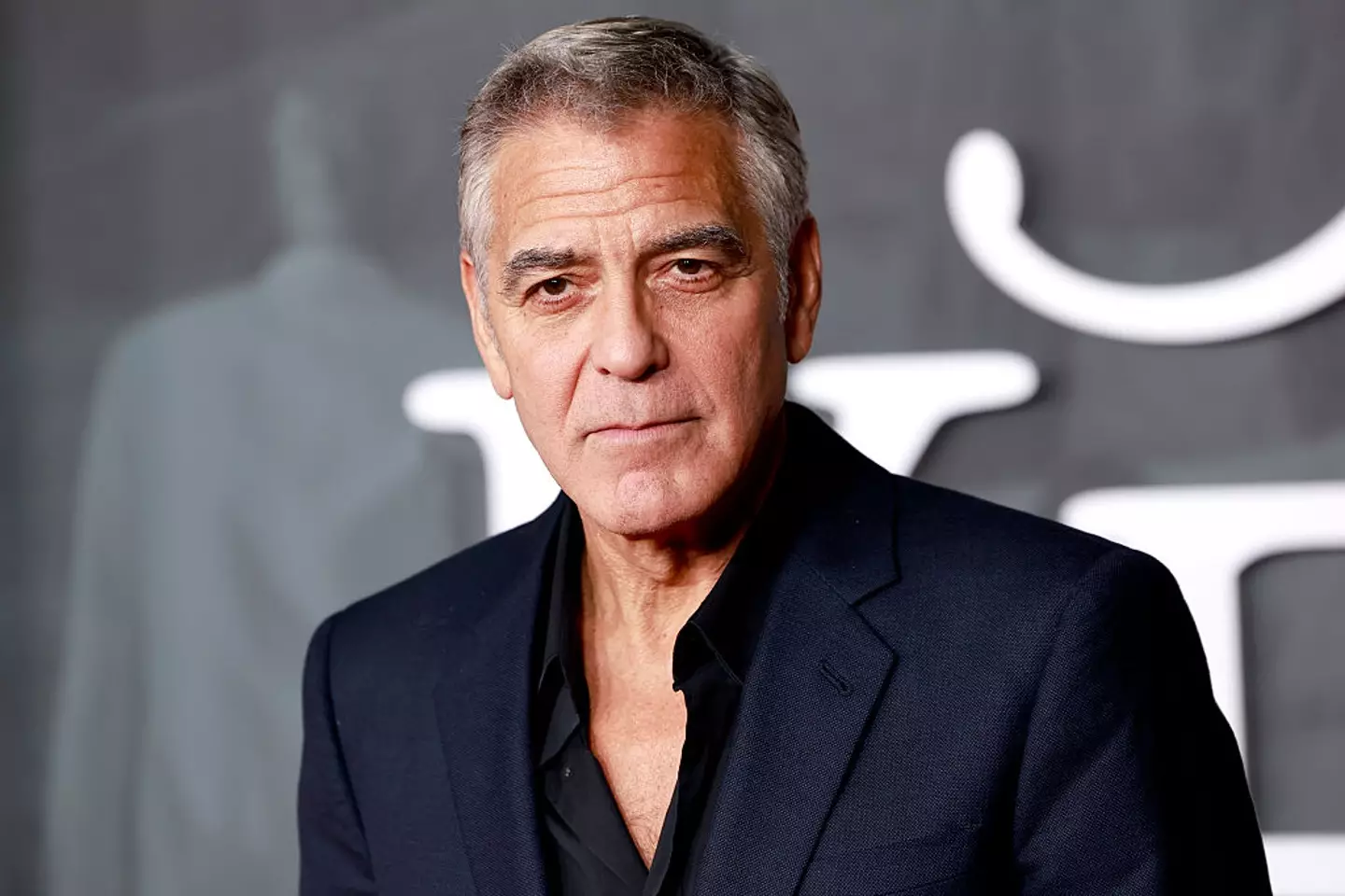 Here's everything you need to know about the ongoing feud between George Clooney and Donald Trump (Frazer Harrison/Getty Images)