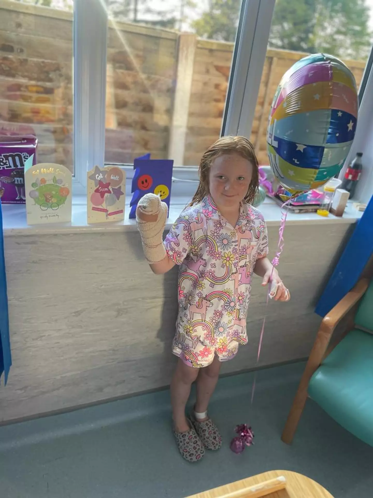 Bella - who is now nine - has returned to school and is 'adapting really well' to the circumstances.
