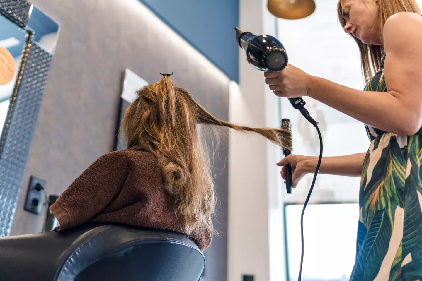 Customers can donate what they want for a haircut.