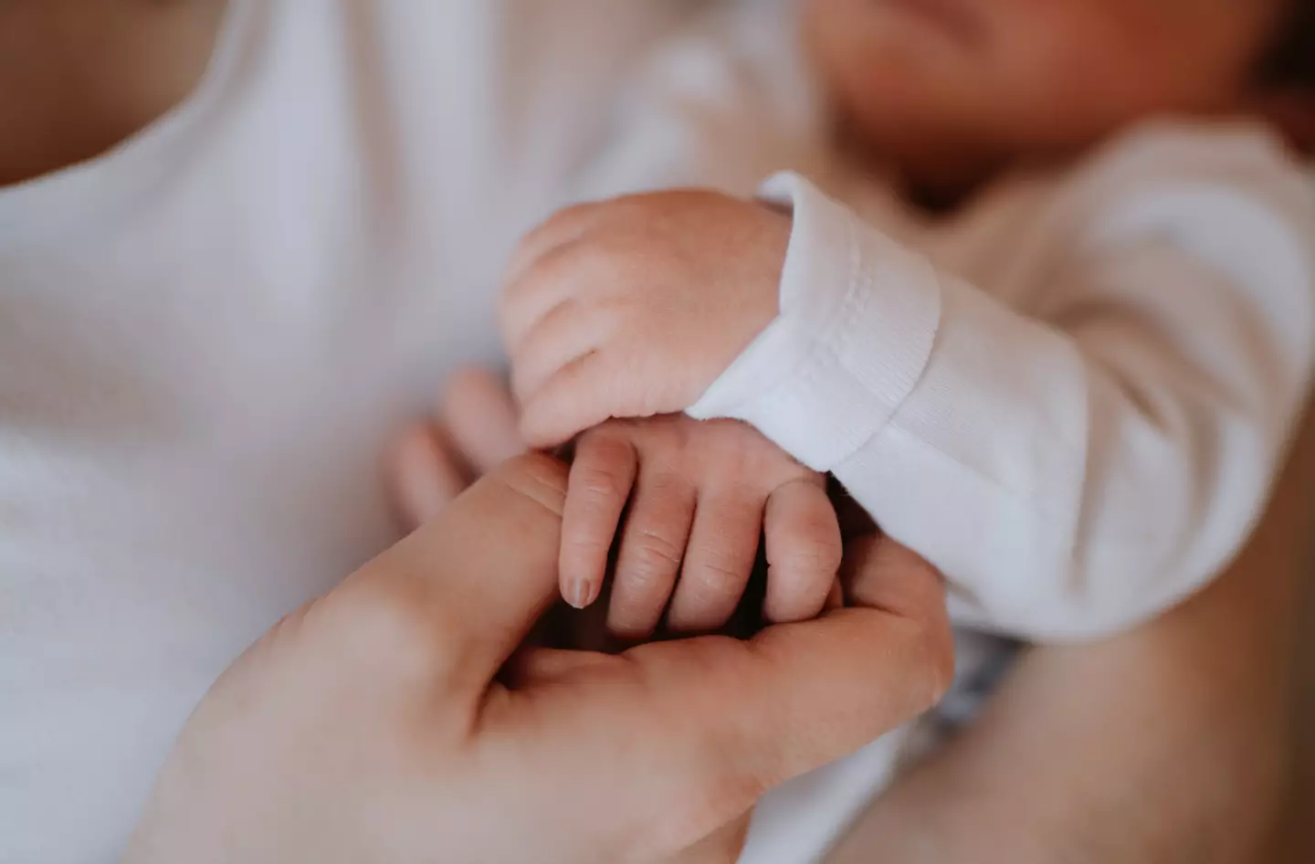 An expert has issued a warning to parents expecting a baby in 2026 over 10 names to avoid (Getty Stock Images)