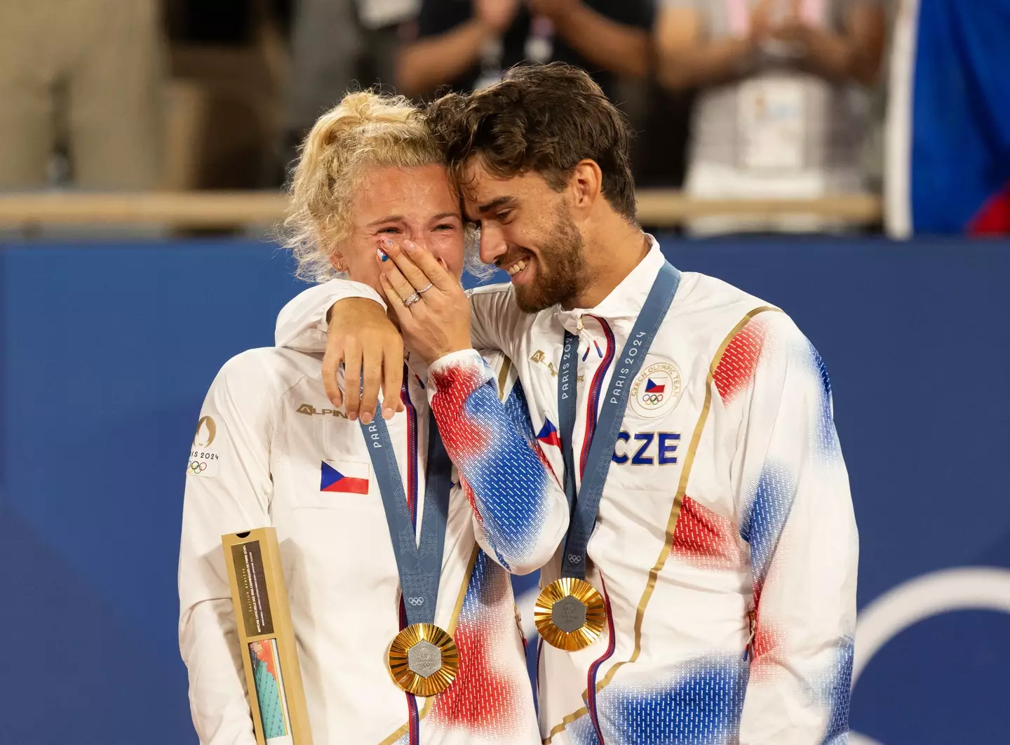 The exes won gold in the mixed doubles. (Tnani Badreddine/DeFodi Images via Getty Images)