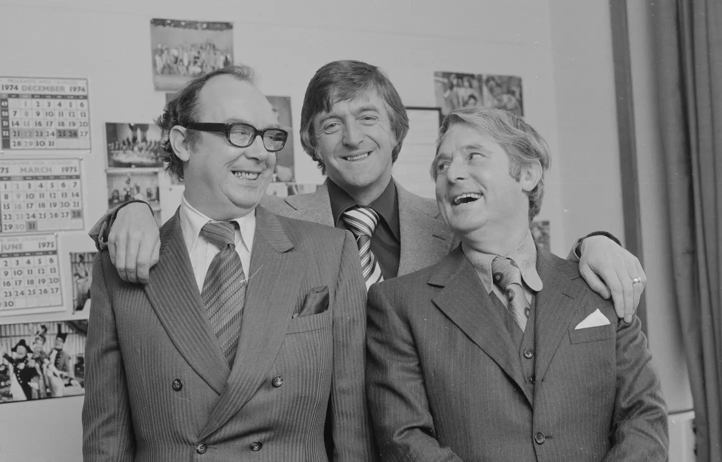 Michael Parkinson with comedians Morecambe and Wise.