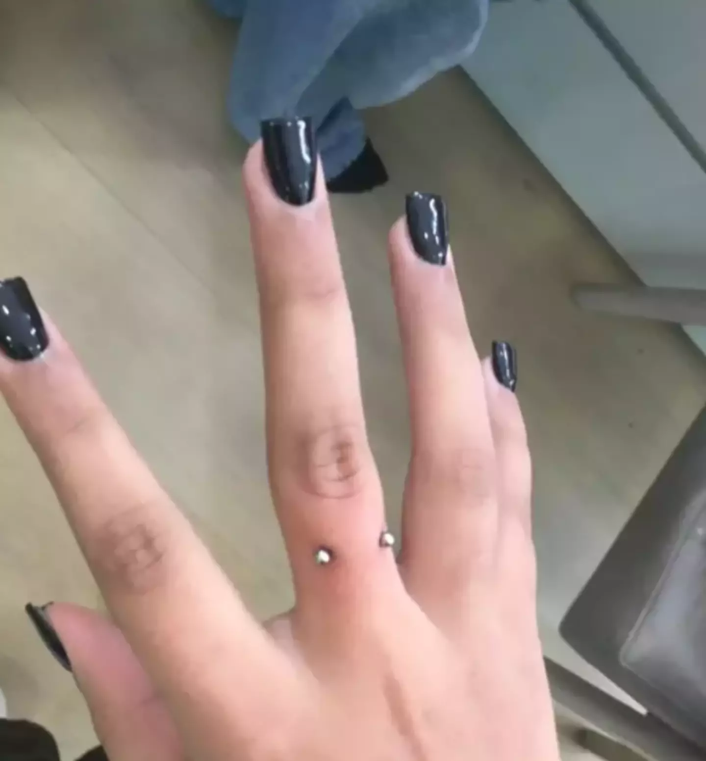 North West's finger piercing (TikTok/@kimandnorth)