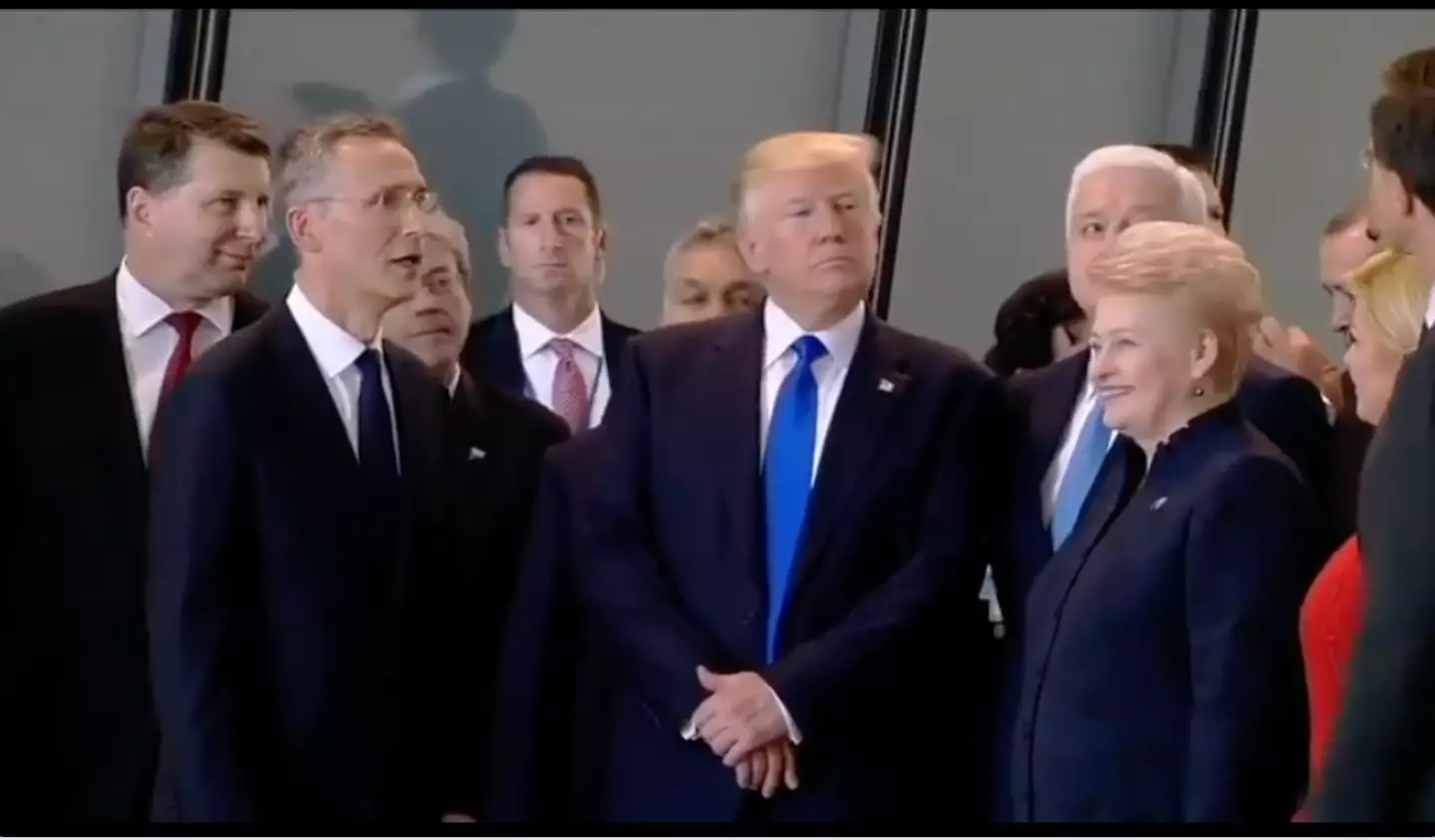 People were left shocked after Donald Trump shoved Montenegro's prime minister Dusko Markovic out of his way at a NATO summit (YouTube/Dragan Pesic)