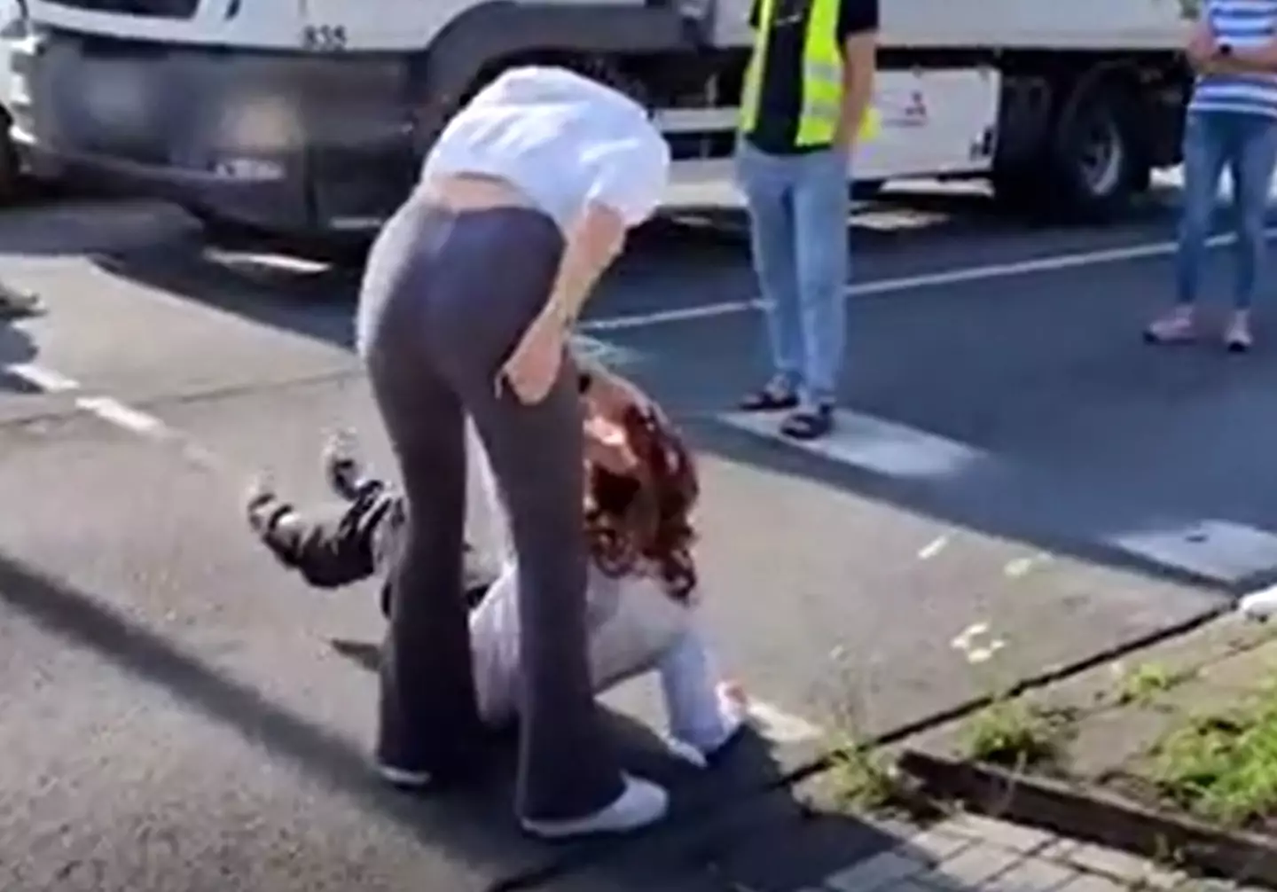 In Germany a climate change protestor was dragged by her hair multiple times.