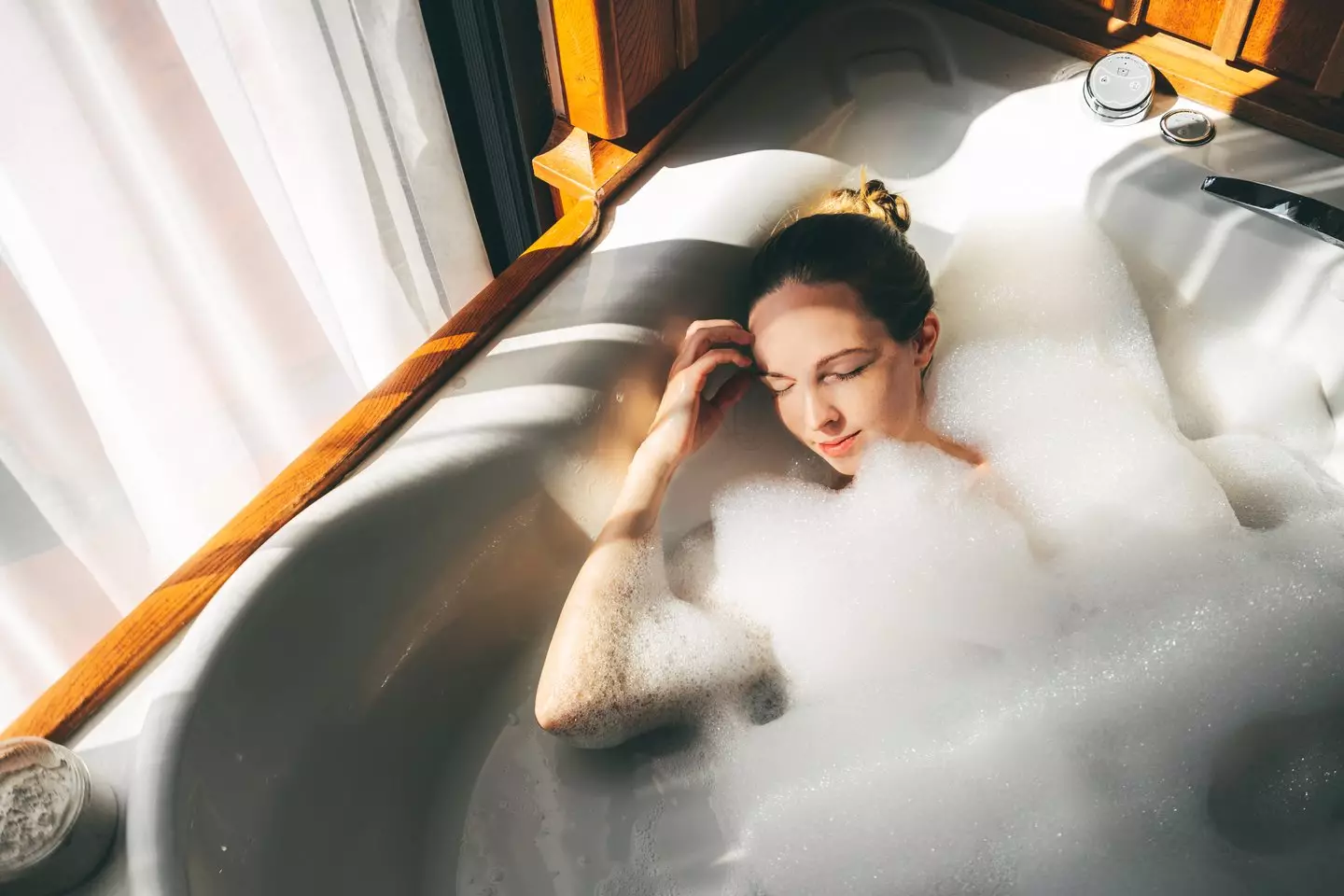 Bathing can reduce some menstrual cramps (Getty Stock Image)